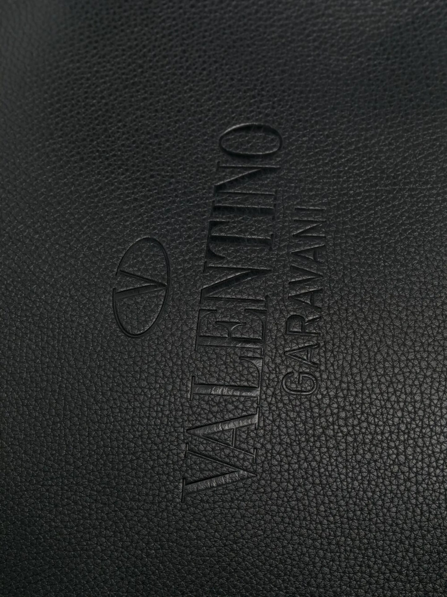 logo-embossed messenger bag