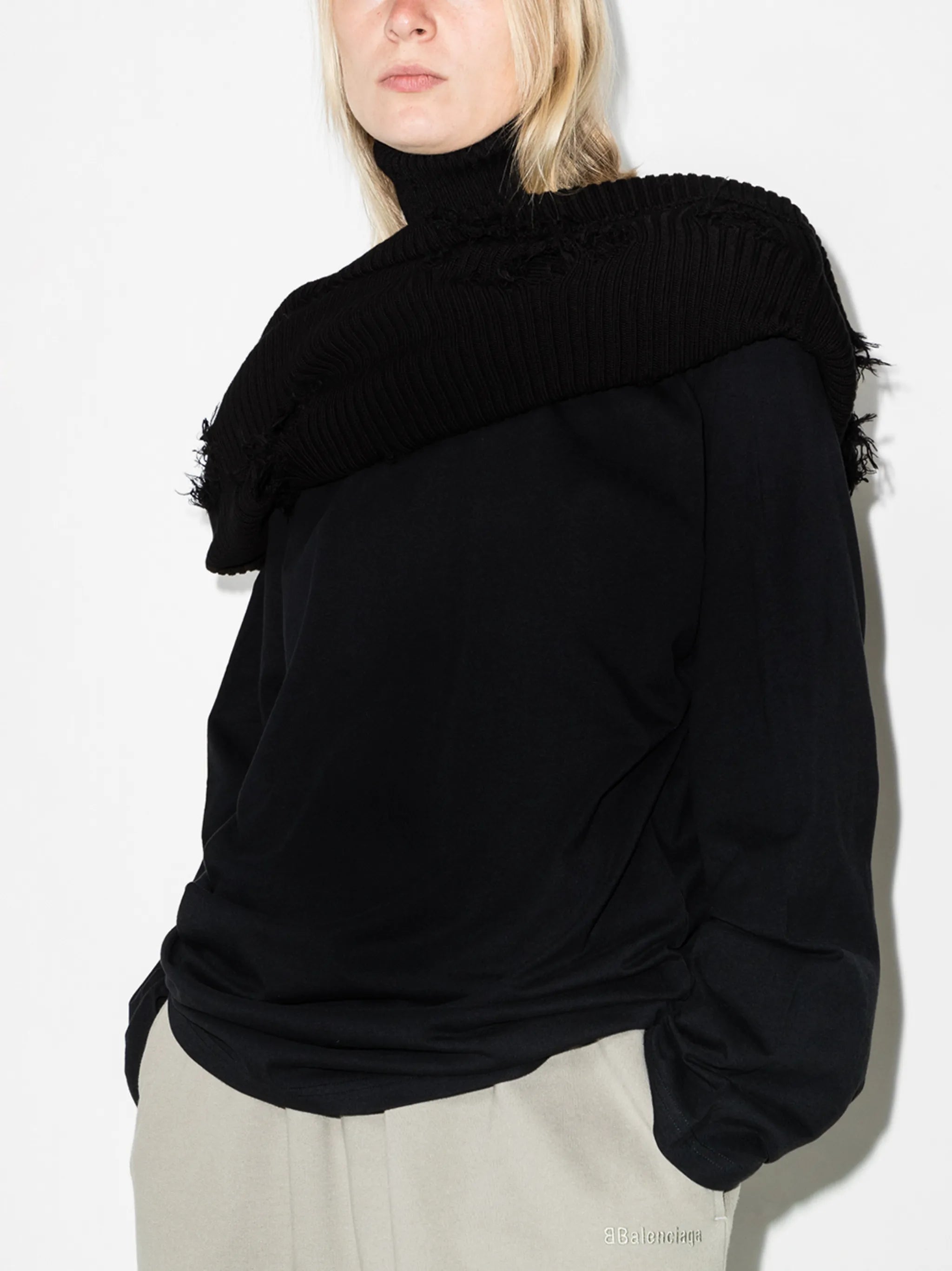 Destroyed ripped roll neck jumper