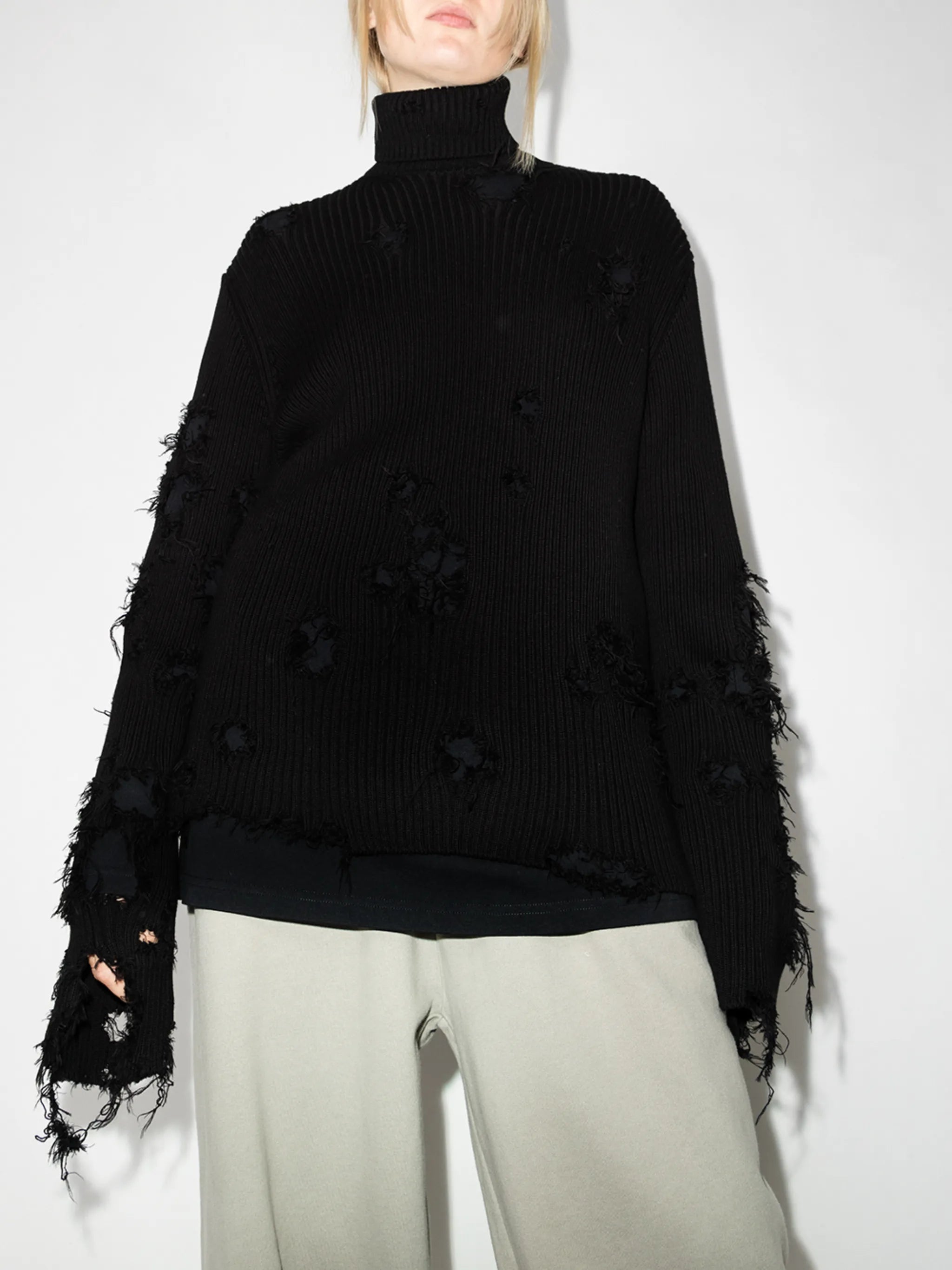 Destroyed ripped roll neck jumper