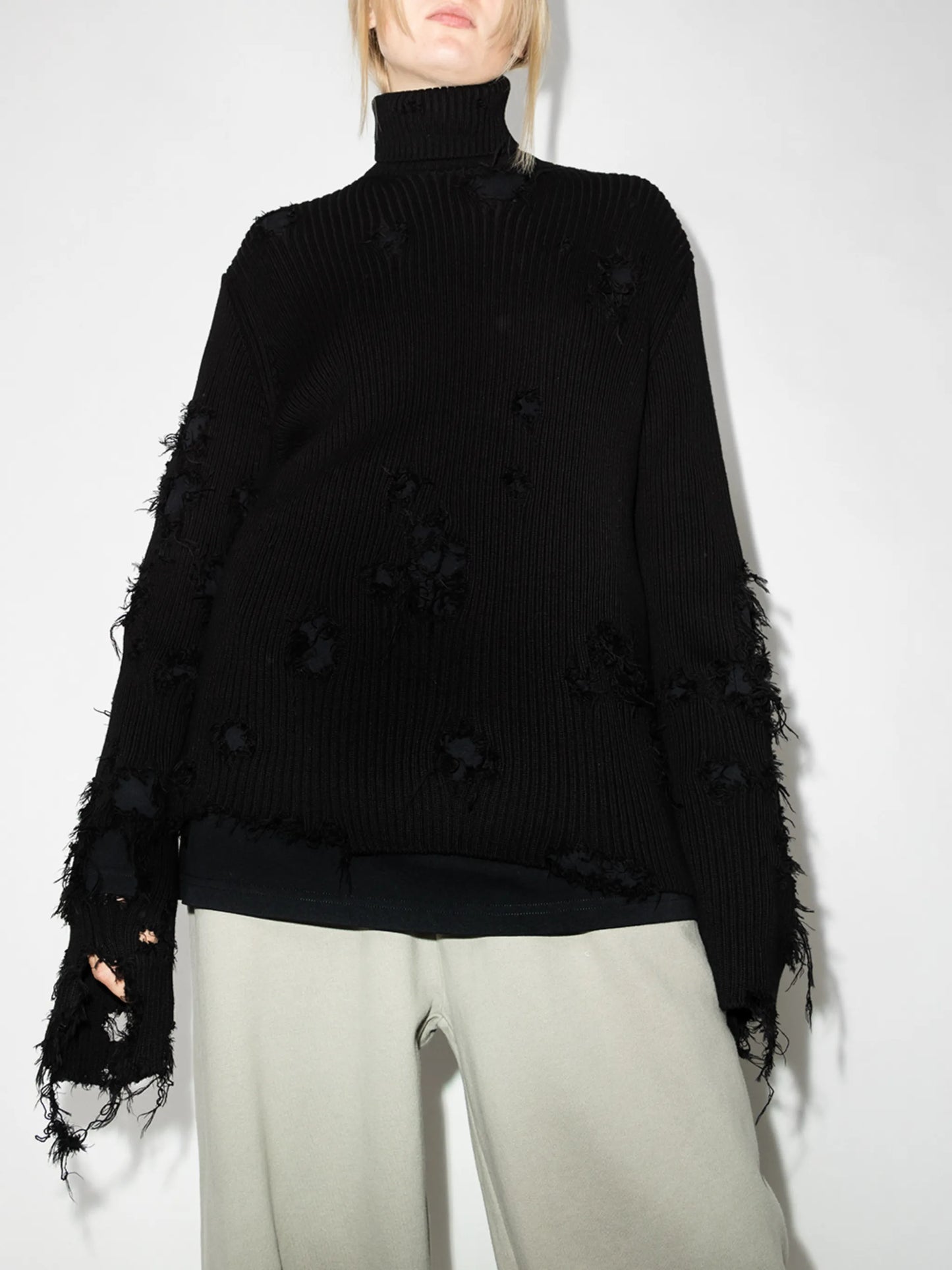 Destroyed ripped roll neck jumper
