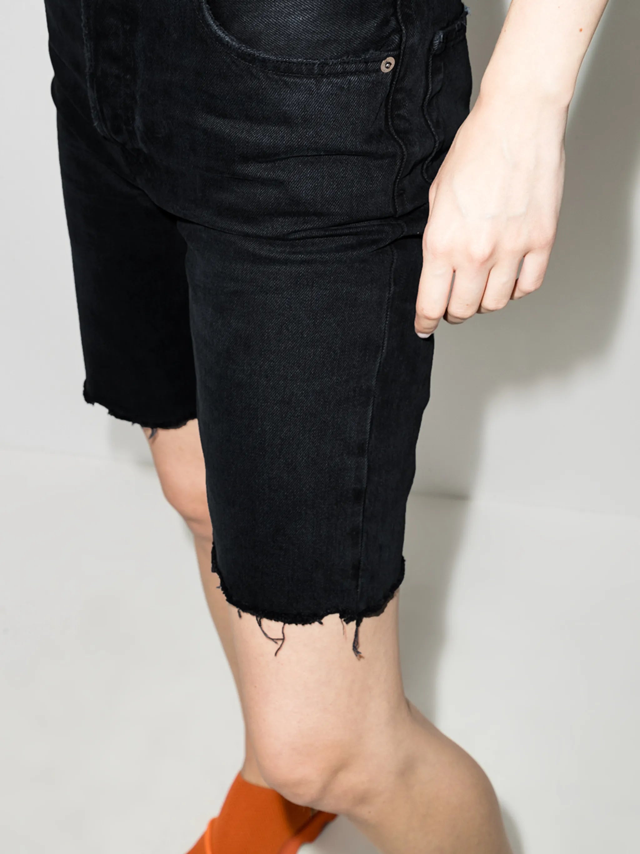 knee-length denim shorts