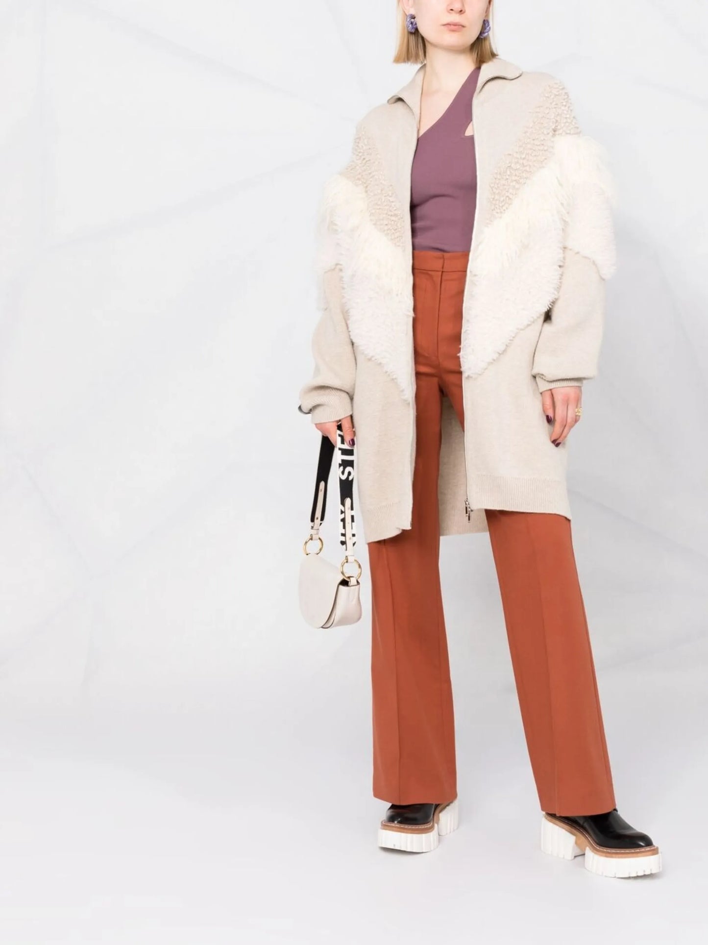 textured-panel knitted coat