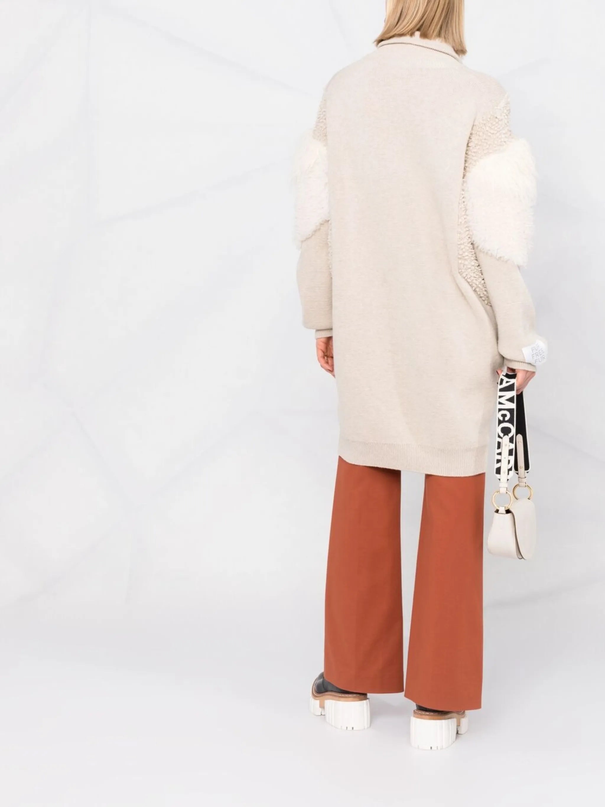 textured-panel knitted coat