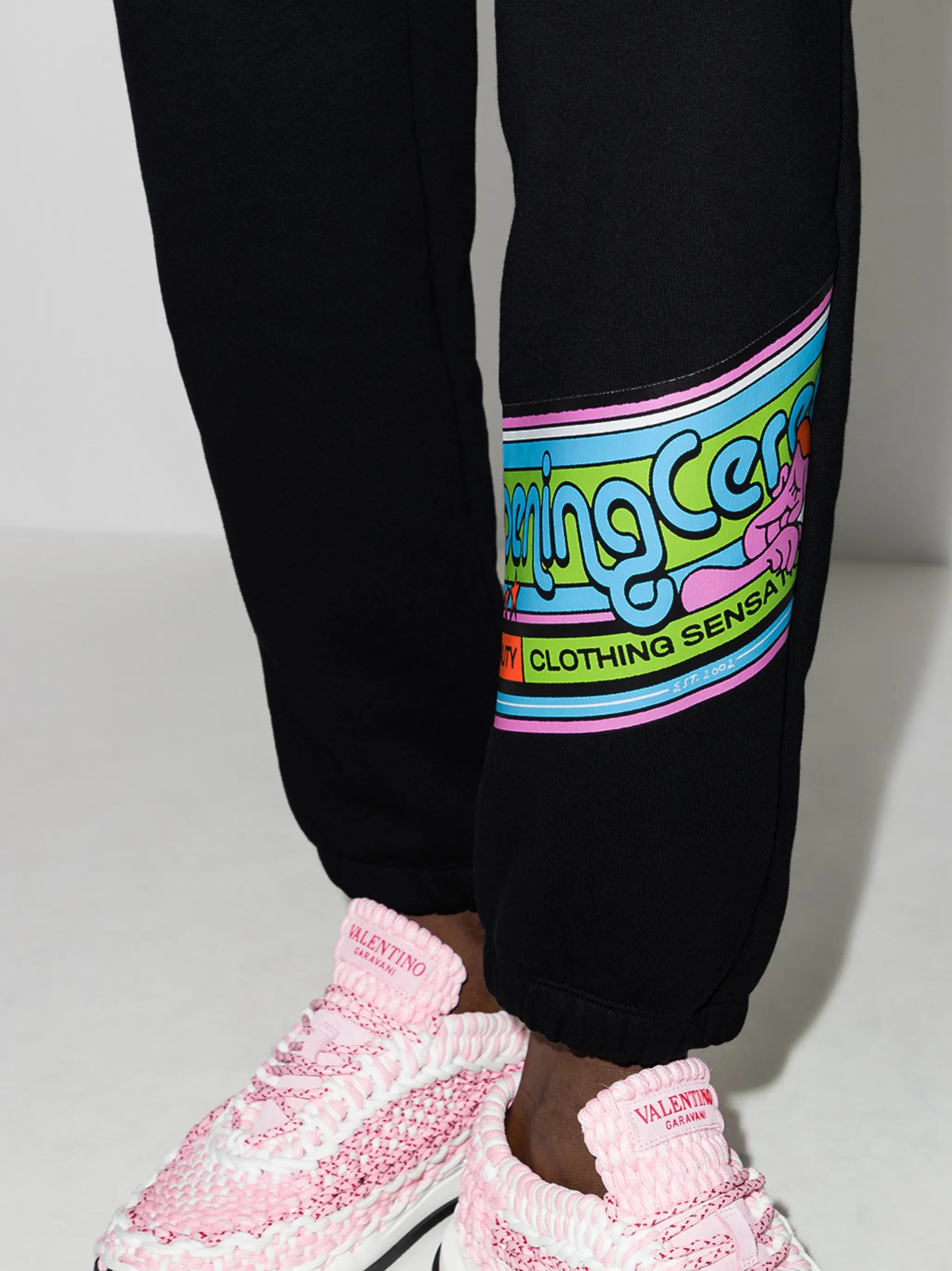 cartoon-print band track pants