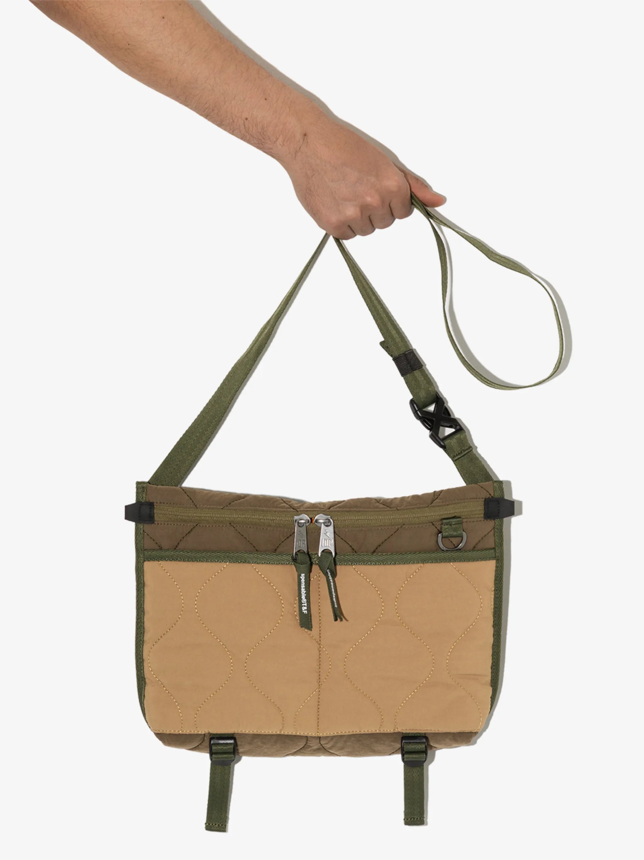Add quilted shoulder bag