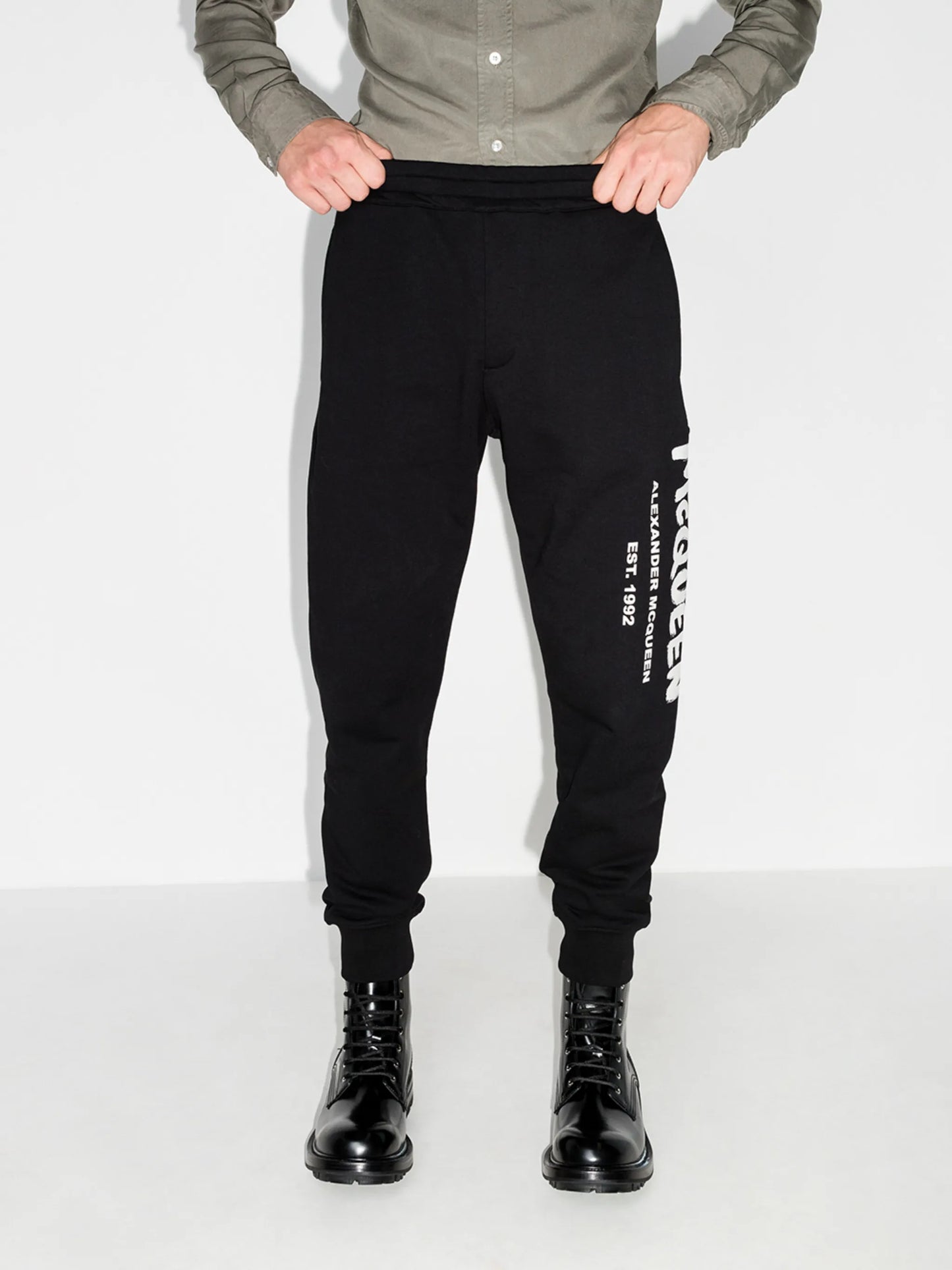 logo graffiti print track pants