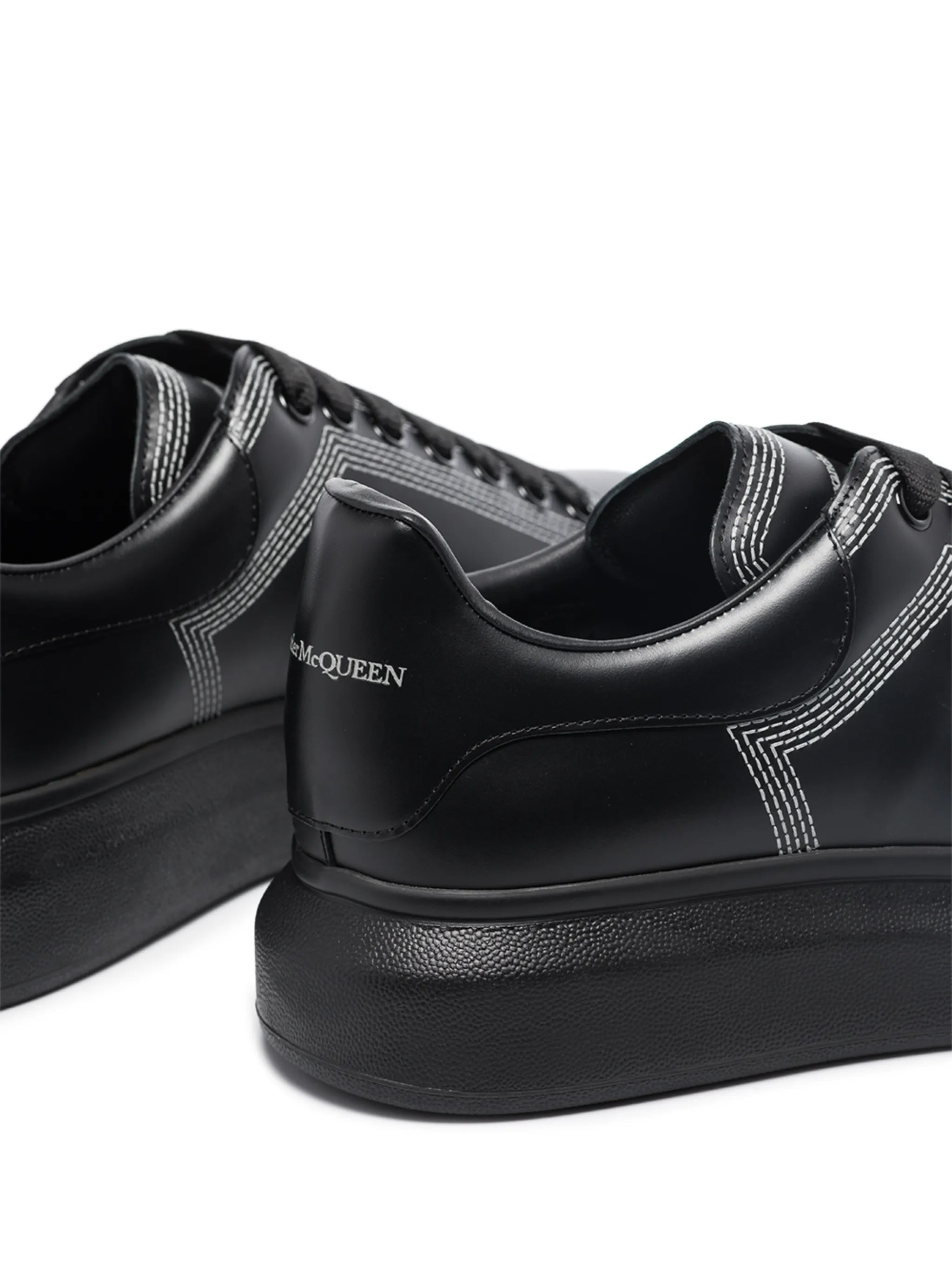 Oversized contrast-stitching sneakers