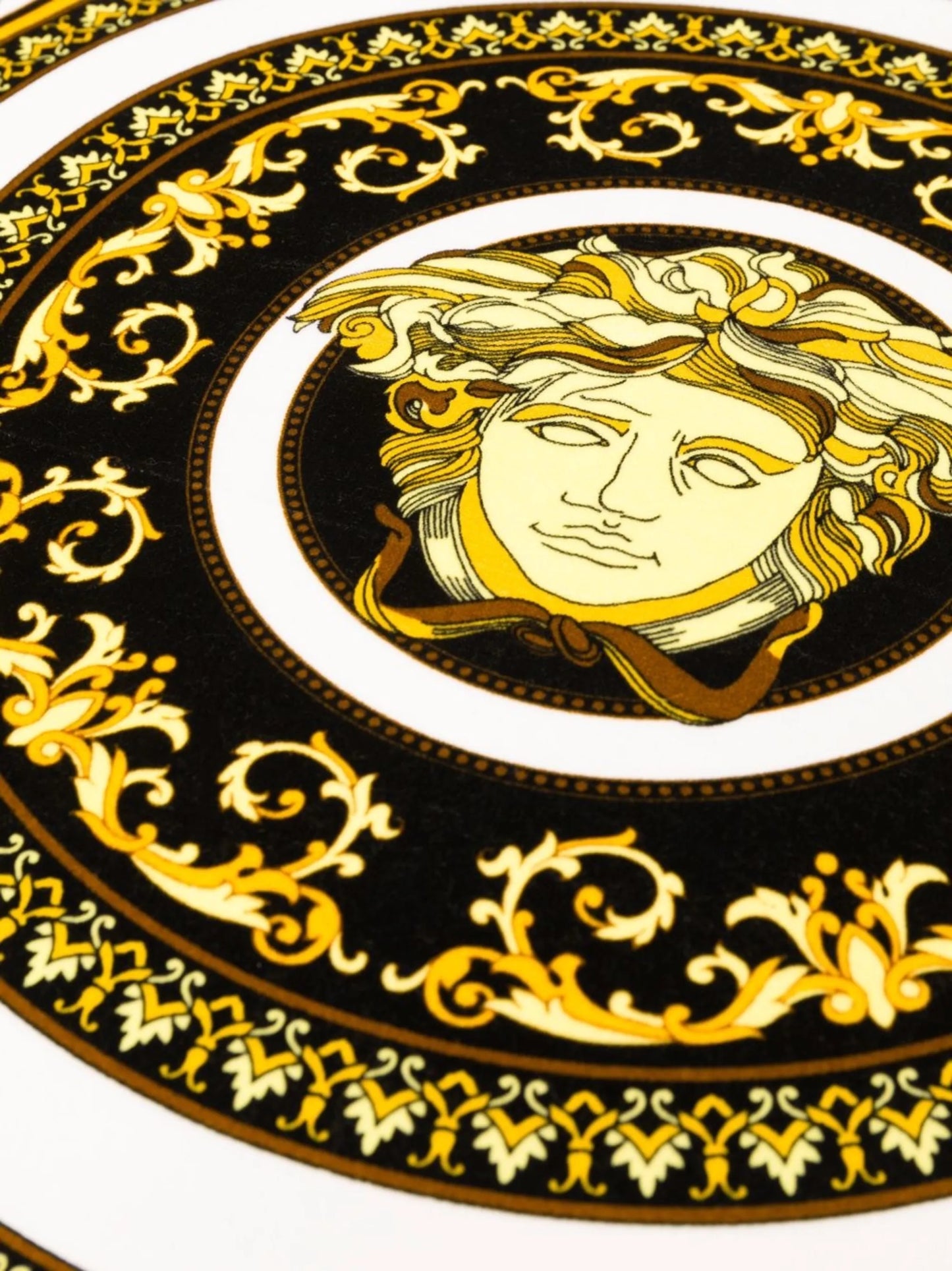 Medusa-head print square cushion