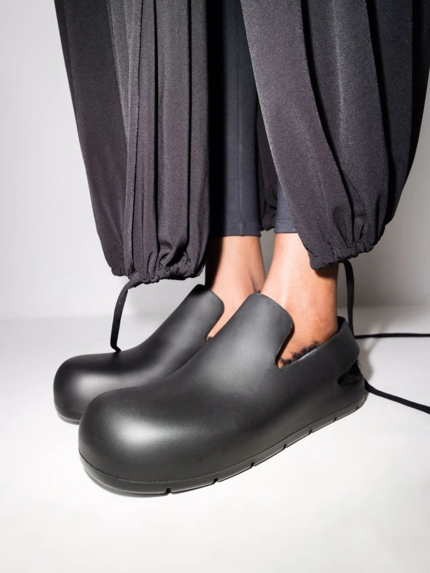 Puddle shearling-lined slingback mules