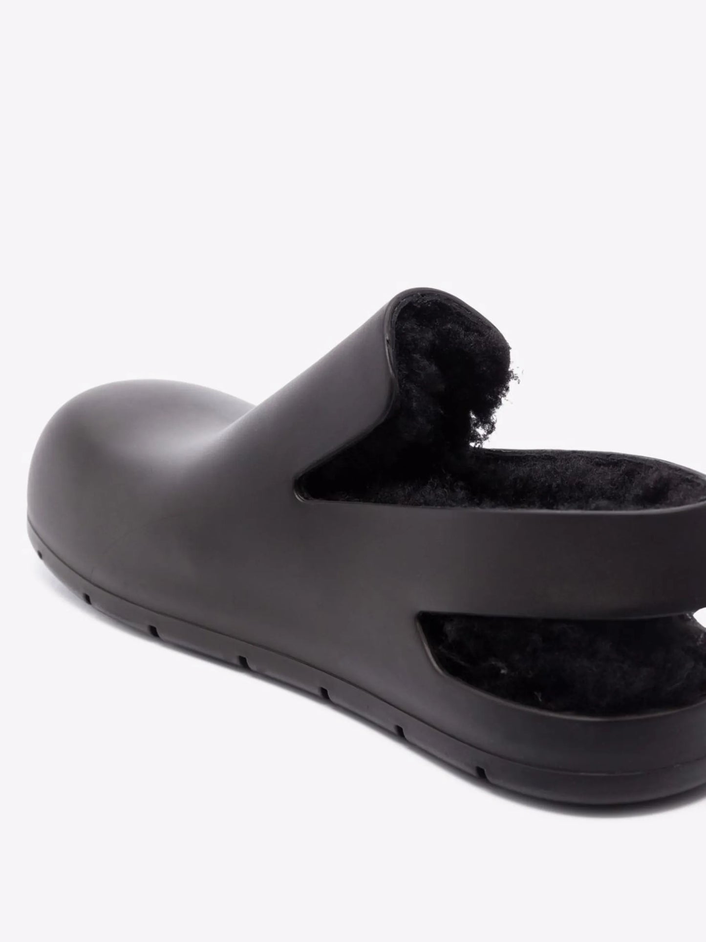 Puddle shearling-lined slingback mules