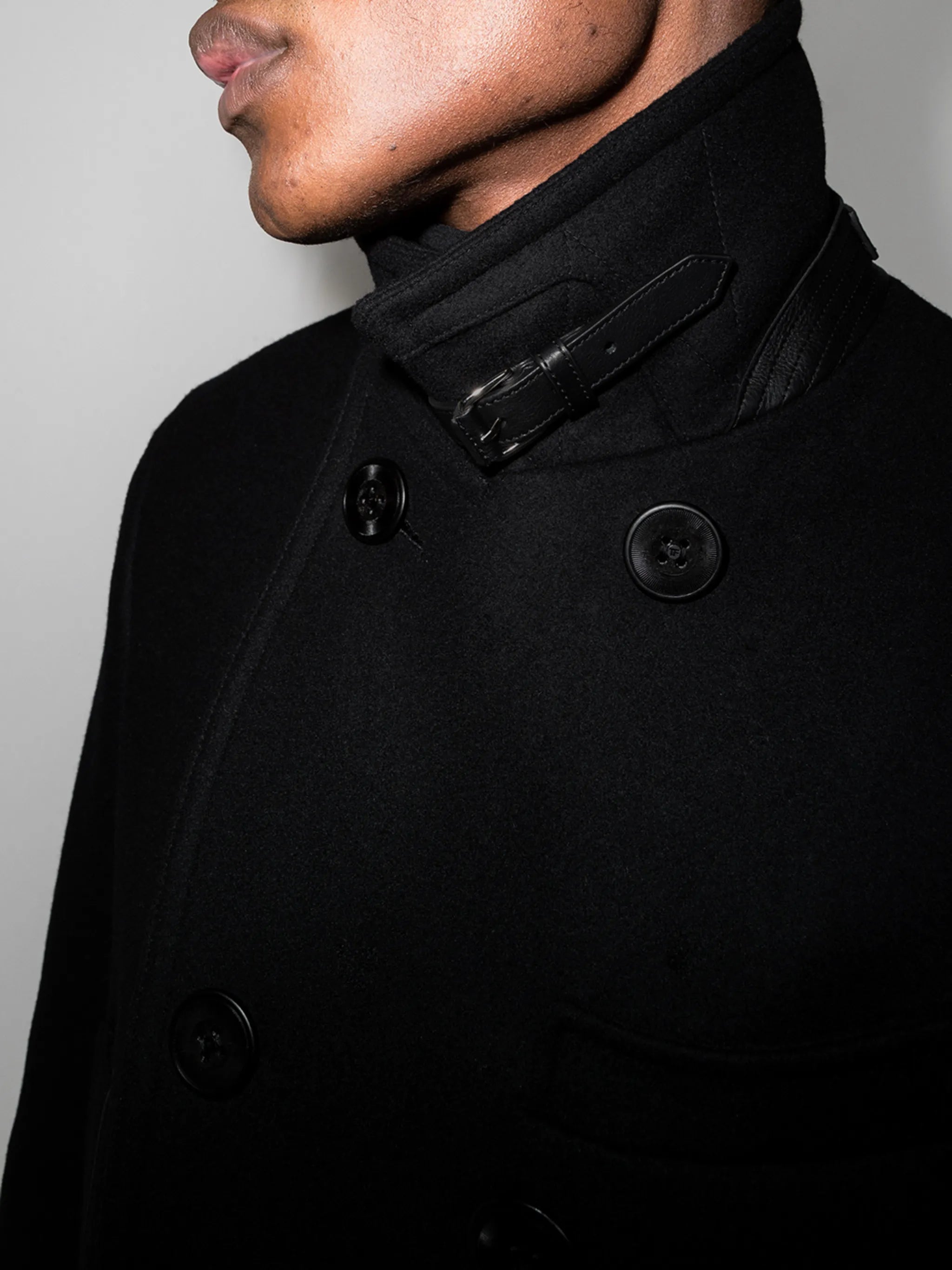 double-breasted buckled coat