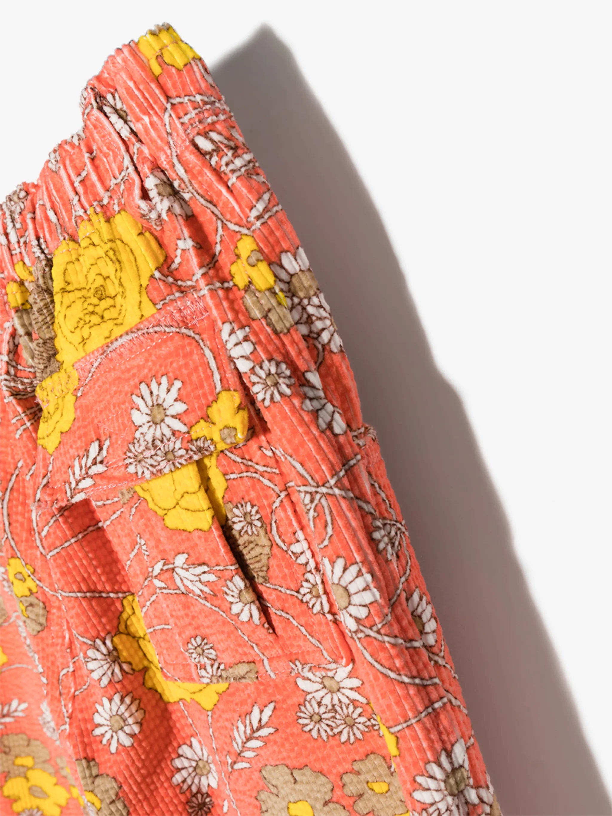 floral-print corduroy trousers