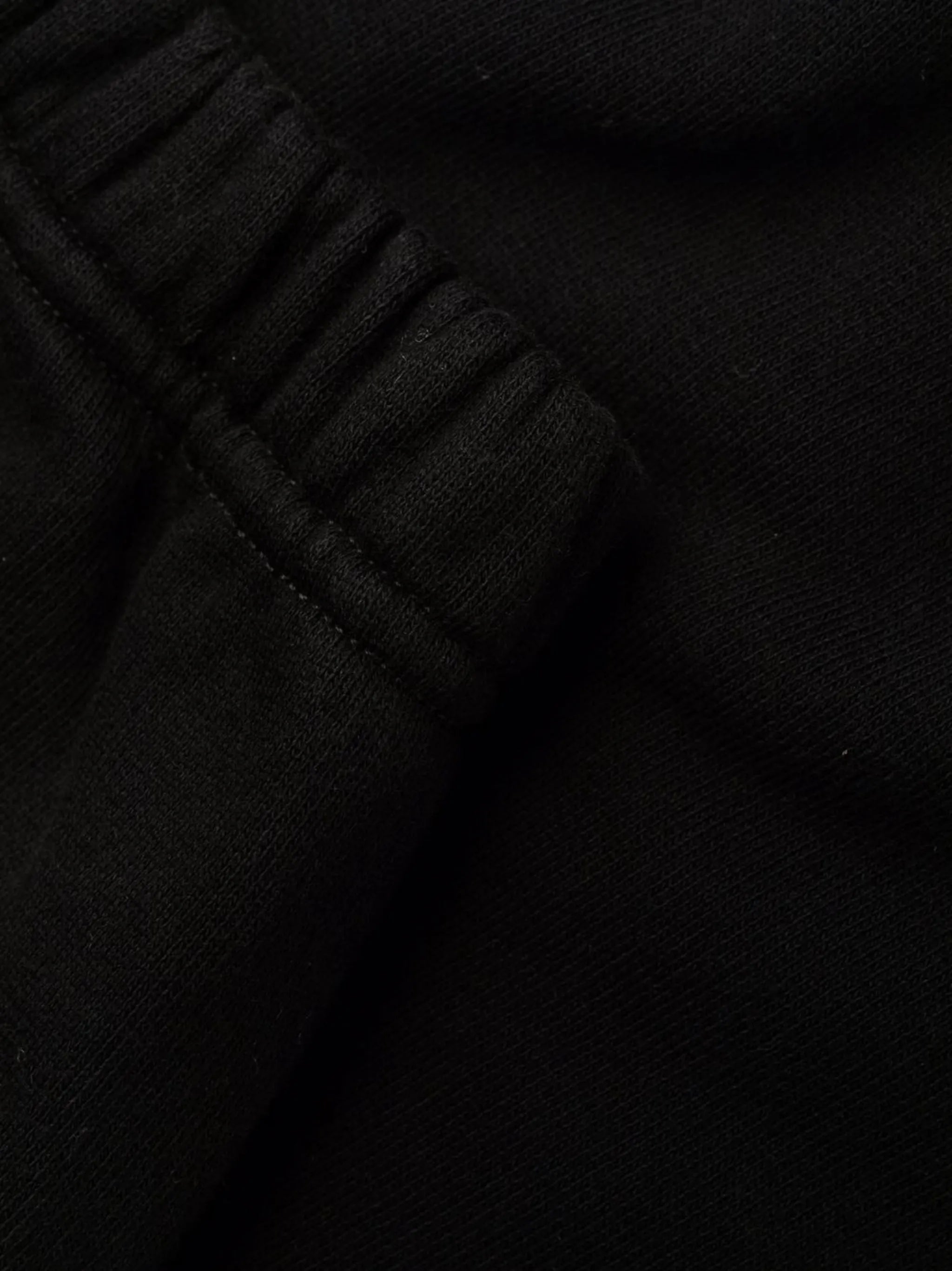 Arrows-printed track pants