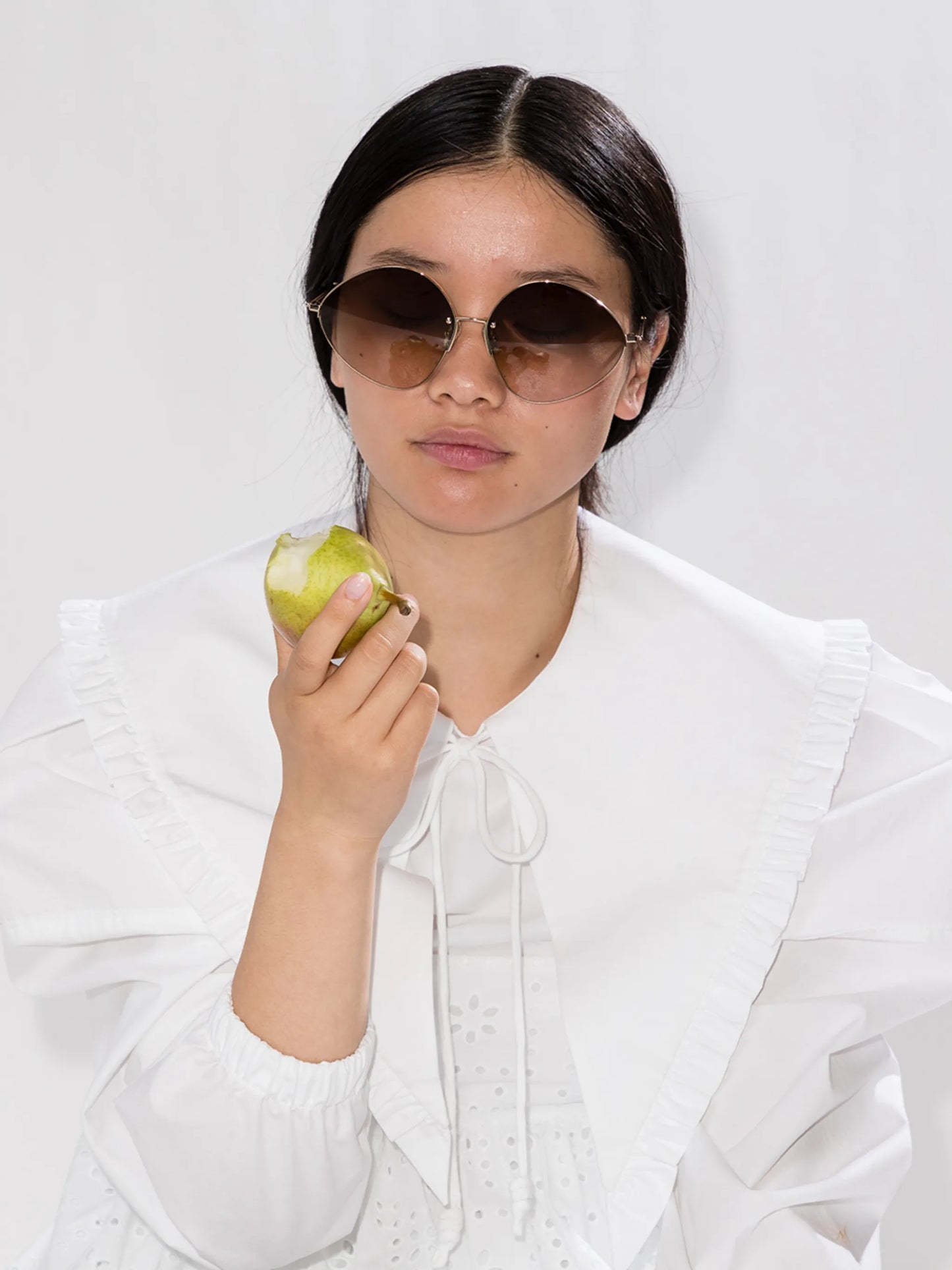 Peak rimless oval-frame sunglasses