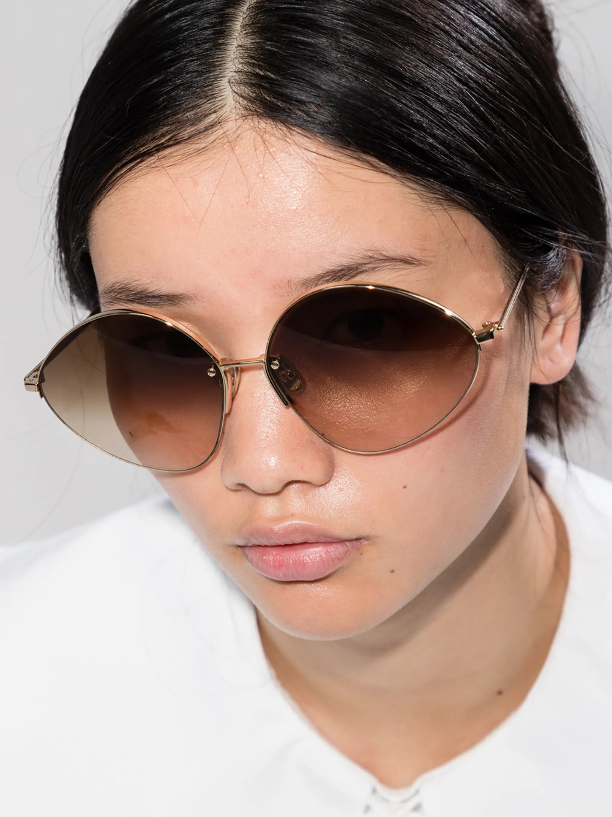Peak rimless oval-frame sunglasses