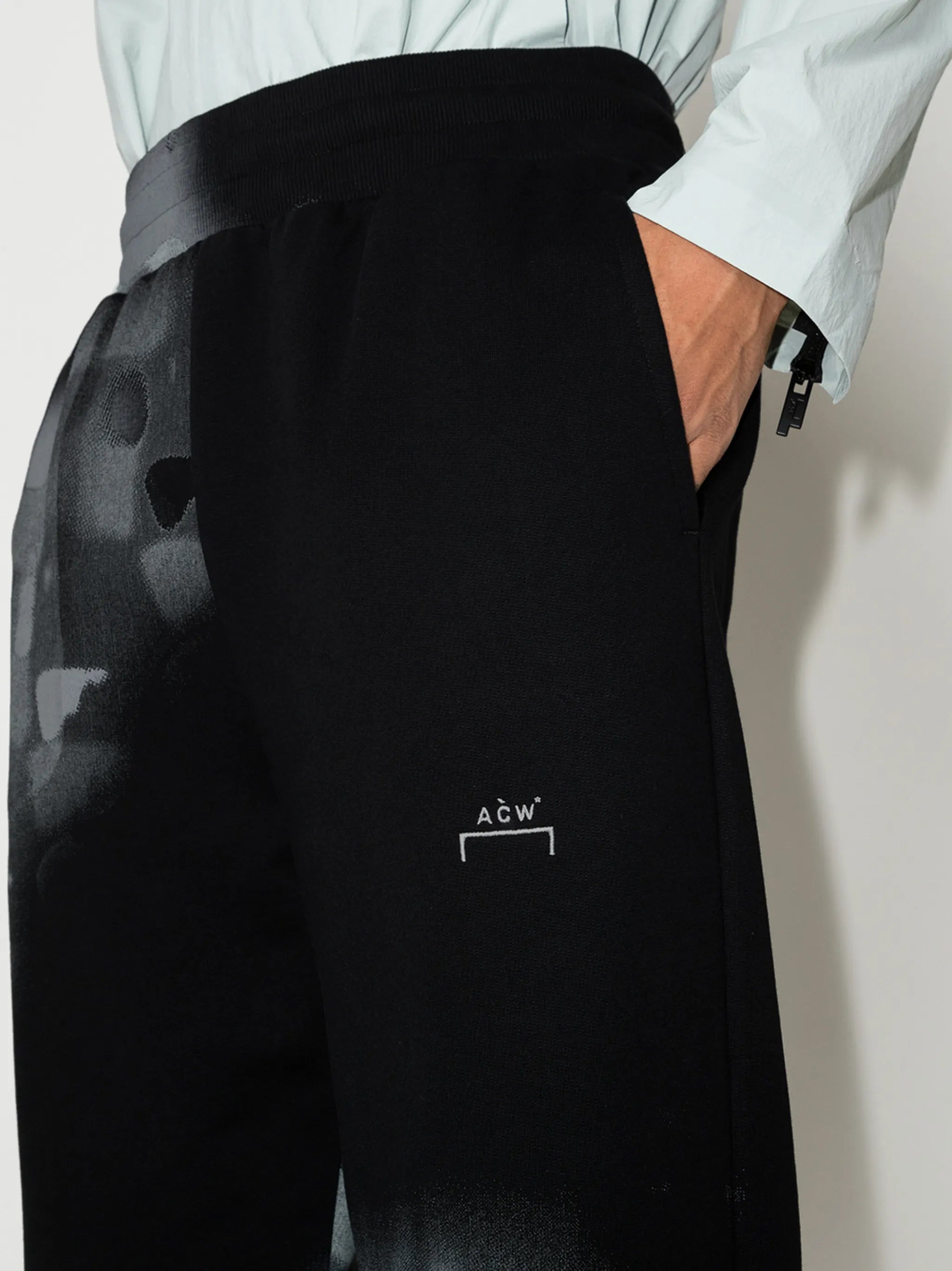 brushstroke-print track pants