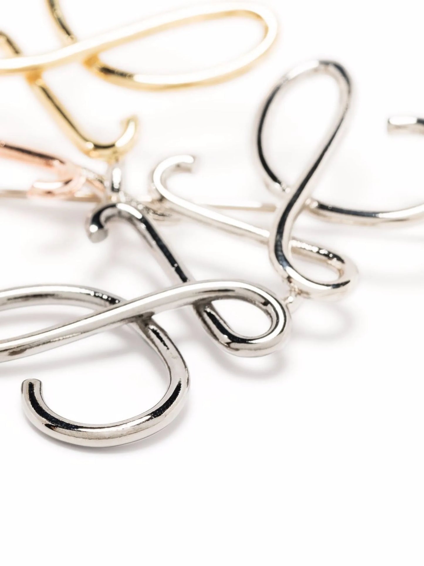 pin-fastening logo brooch