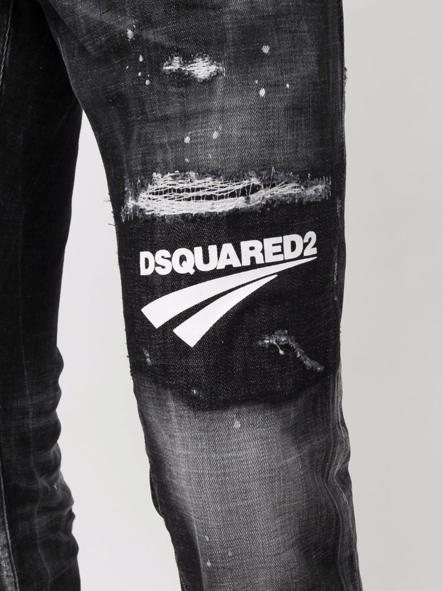distressed logo patch jeans