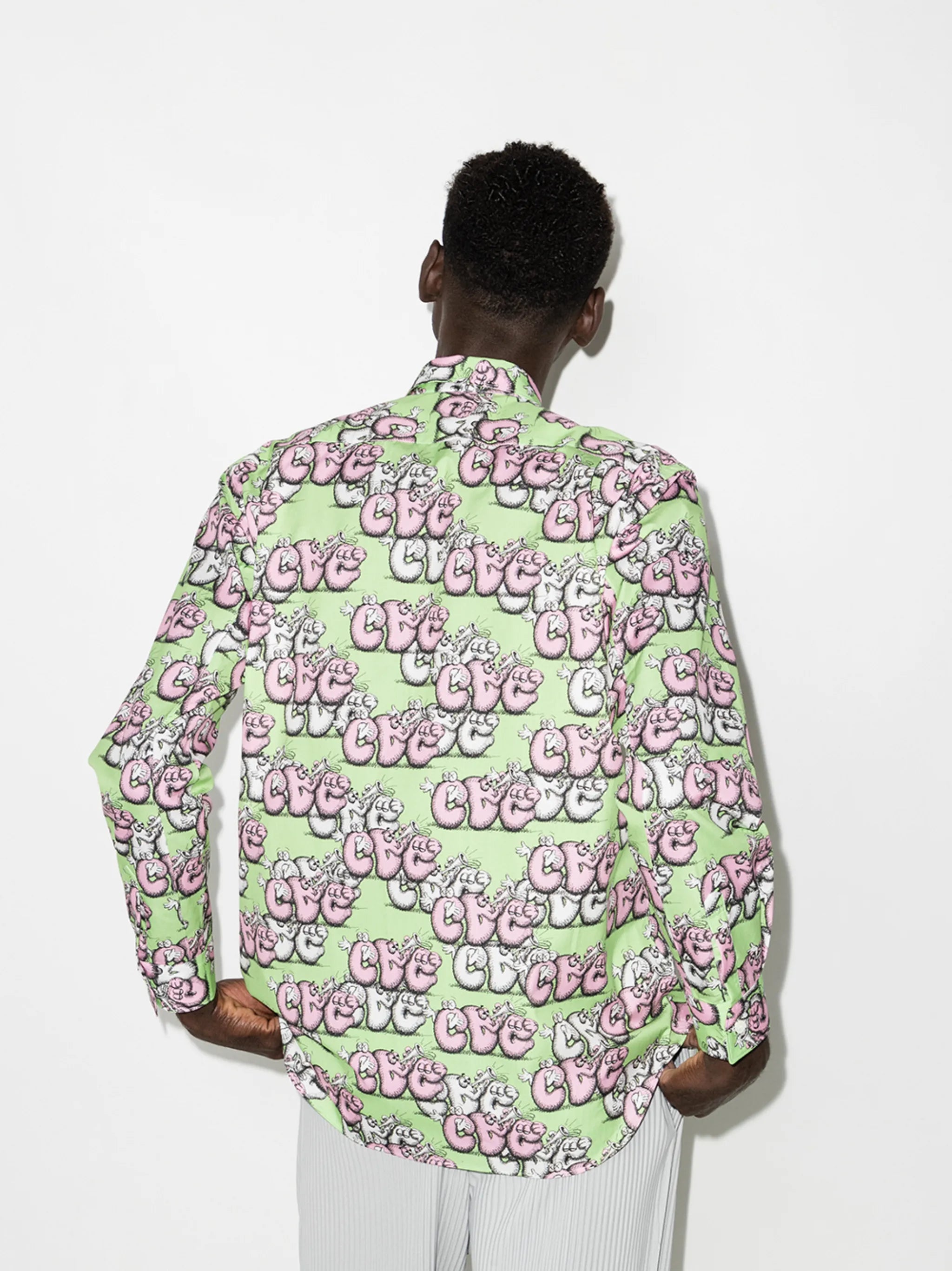 x KAWS graphic-print shirt