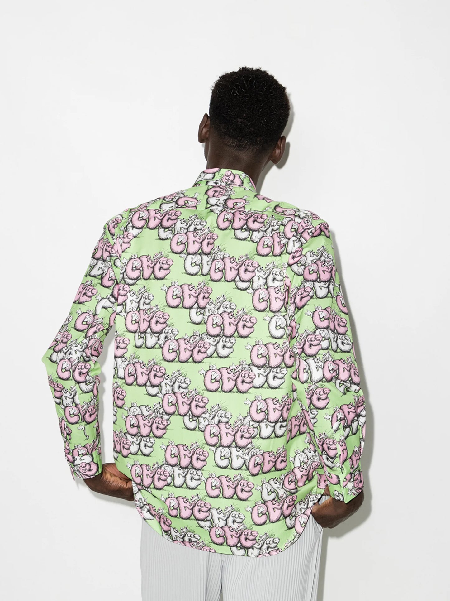 x KAWS graphic-print shirt