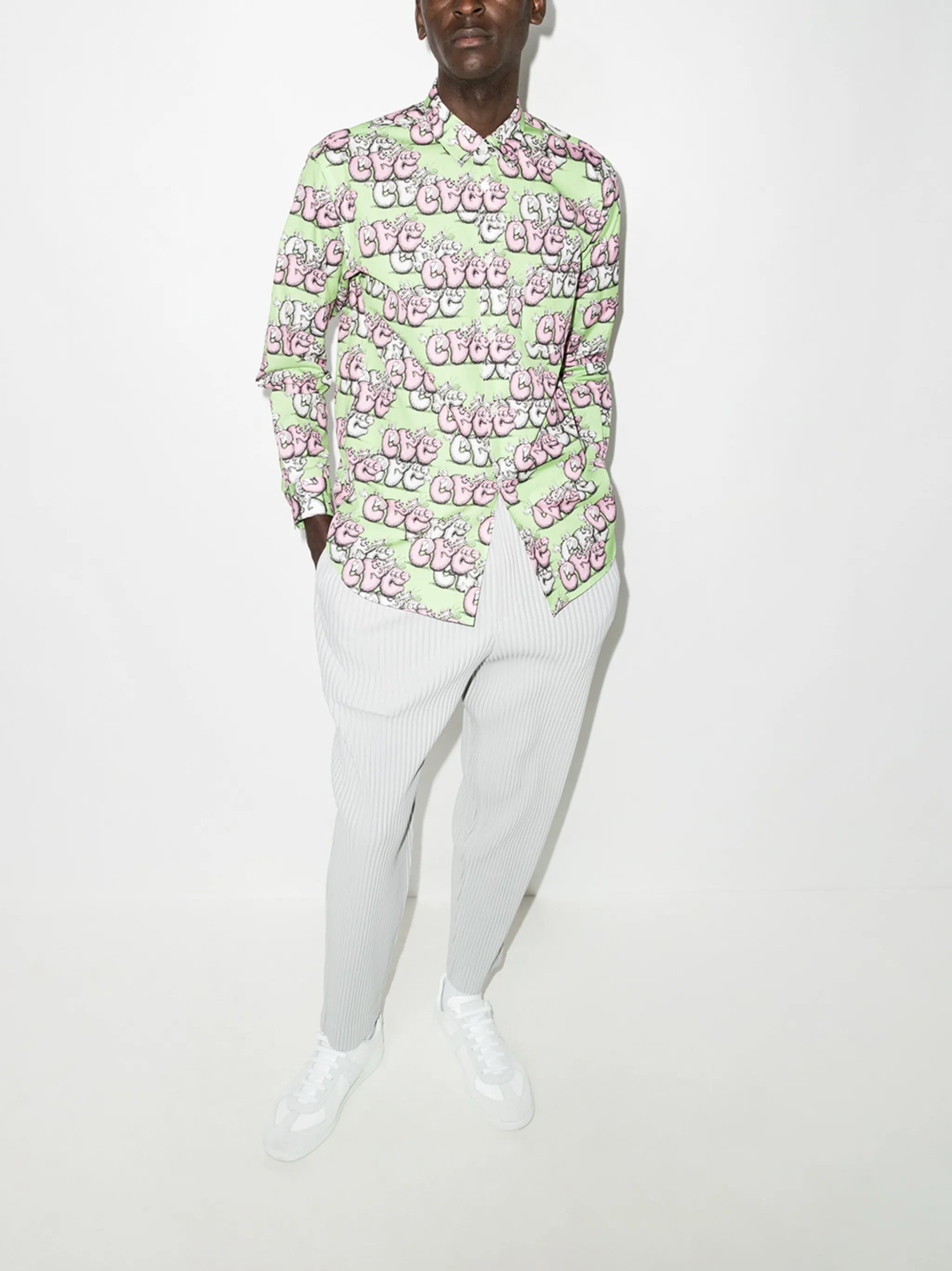 x KAWS graphic-print shirt