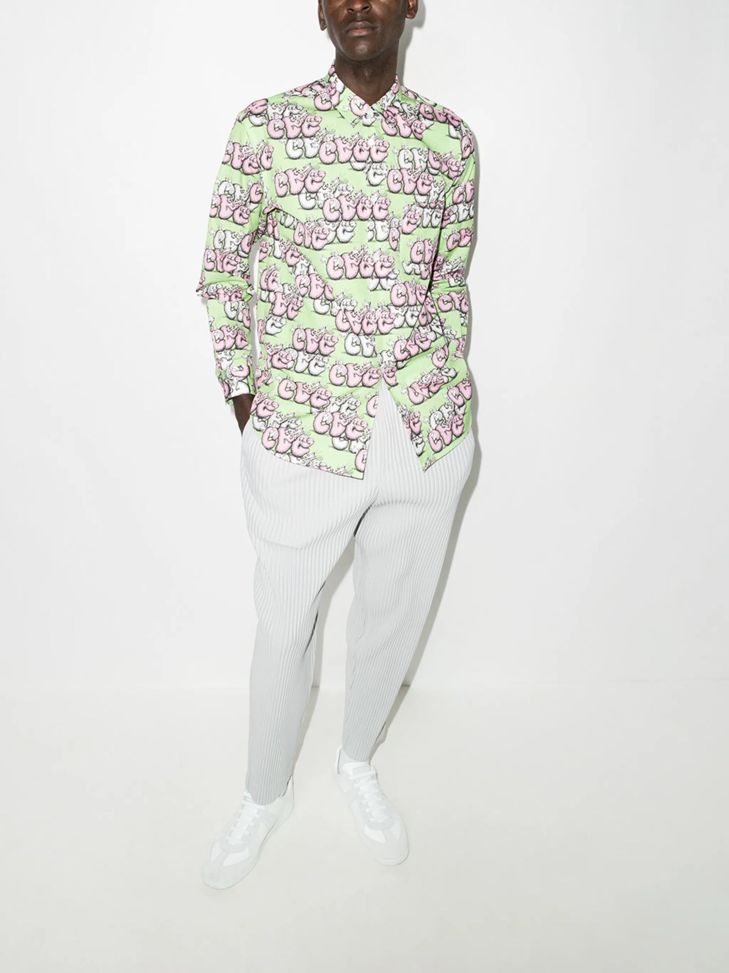 x KAWS graphic-print shirt