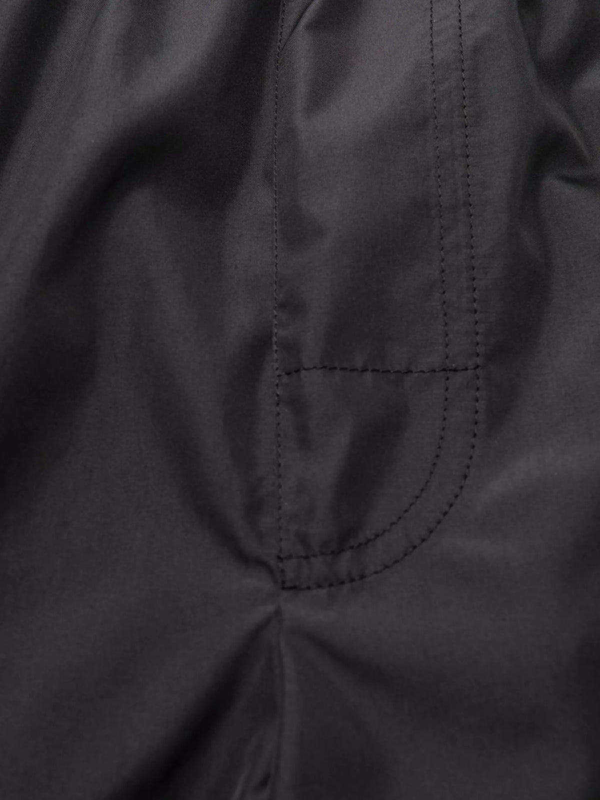 mid-length swim trunks with branded stretch waistband