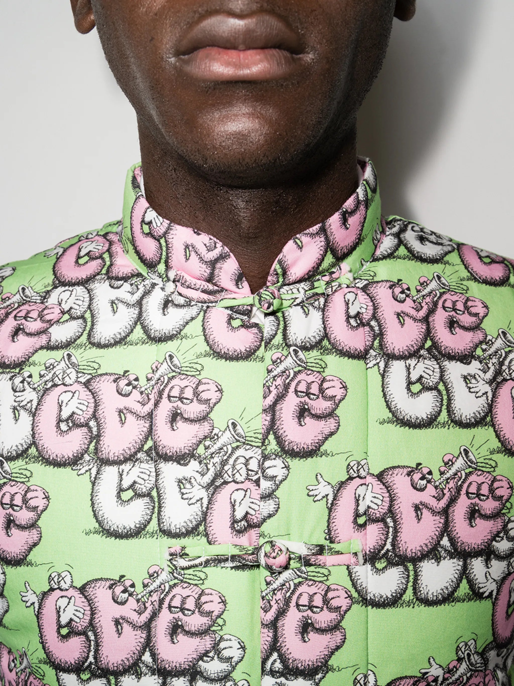 x KAWS cartoon logo gilet
