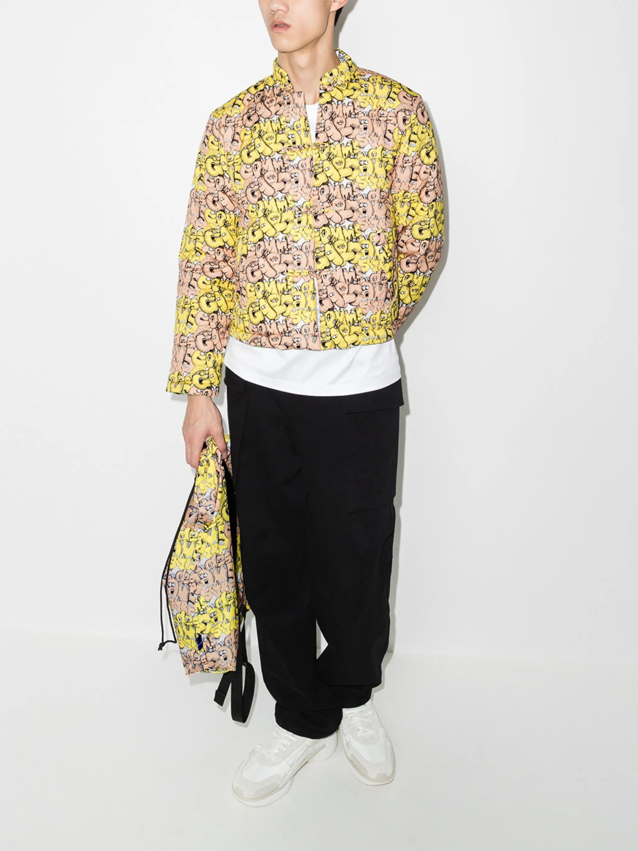 x KAWS all-over logo jacket