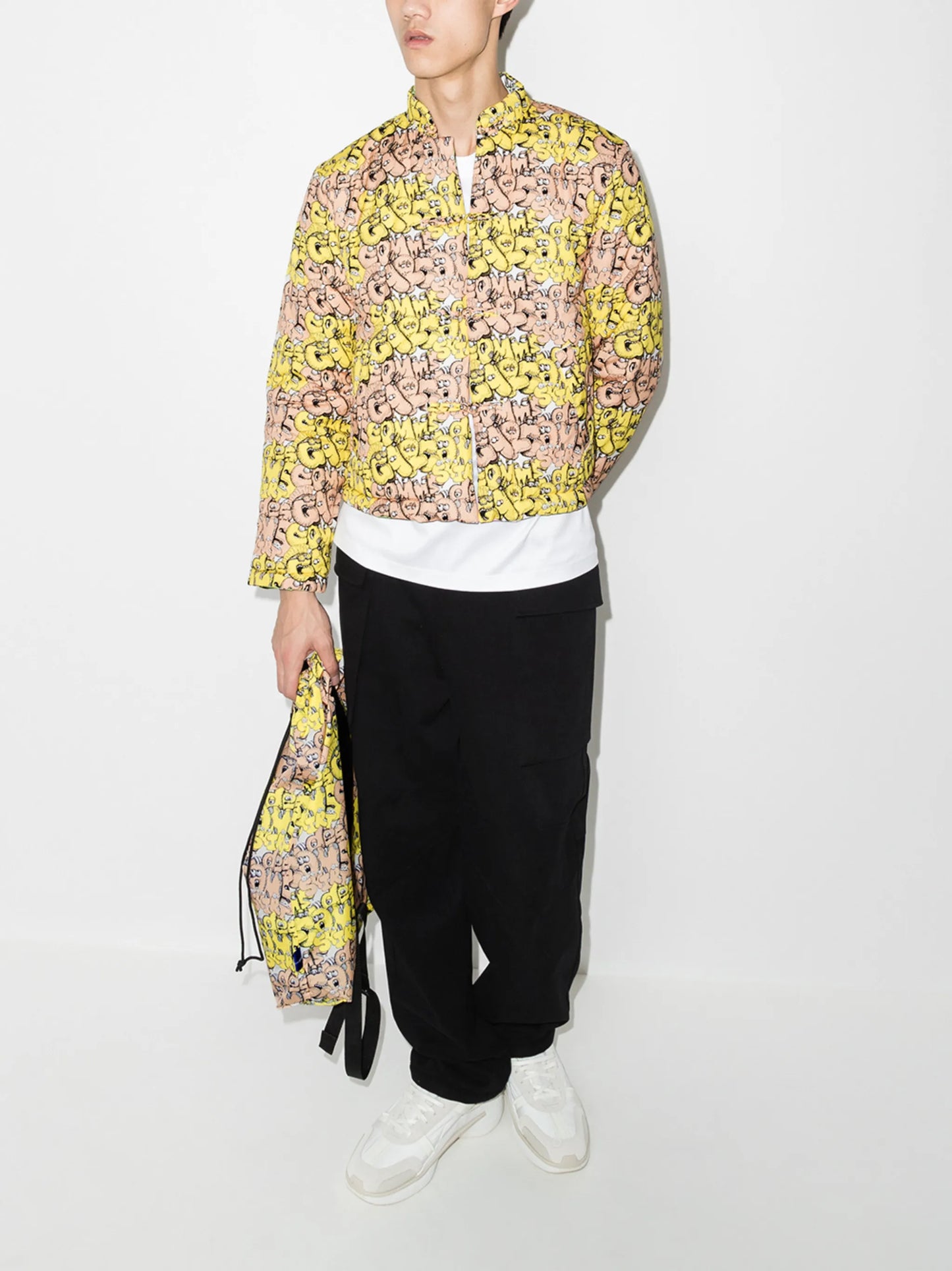 x KAWS all-over logo jacket