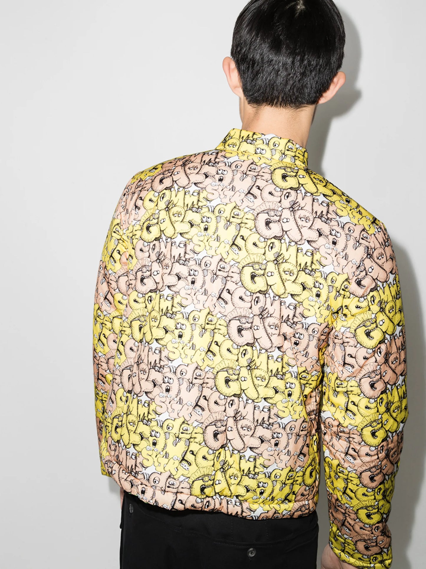 x KAWS all-over logo jacket