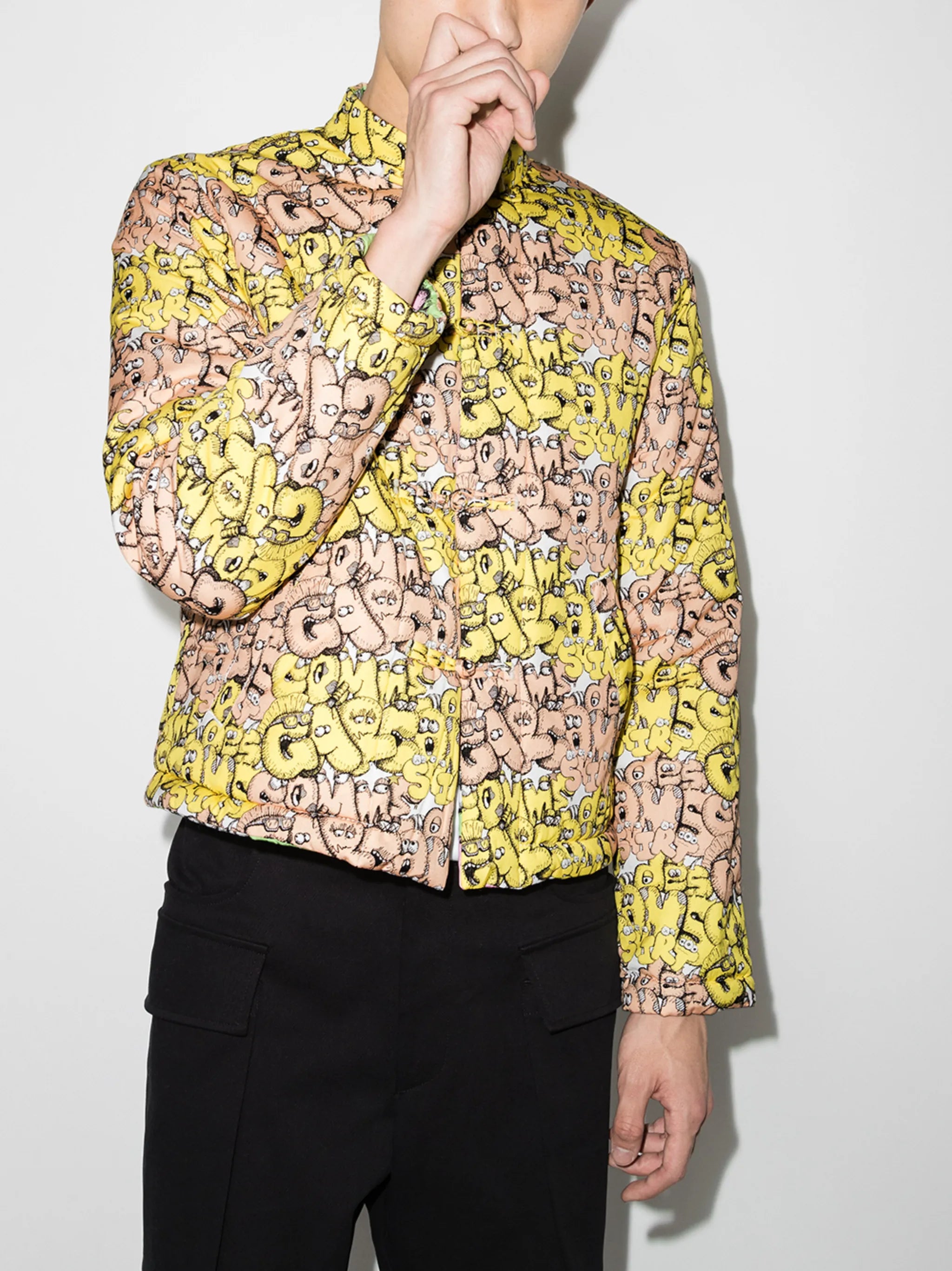x KAWS all-over logo jacket