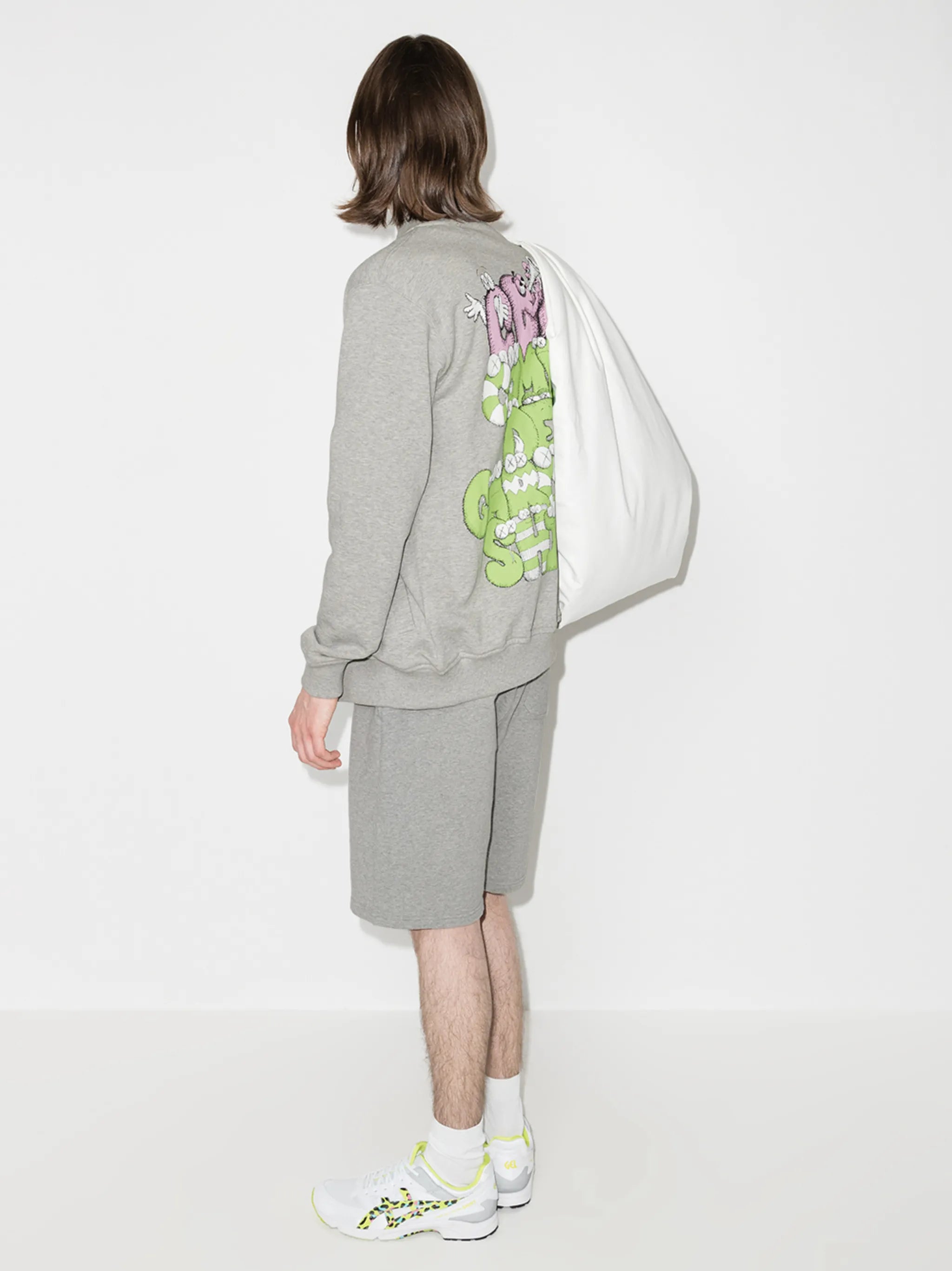 x KAWS graphic-print bomber jacket