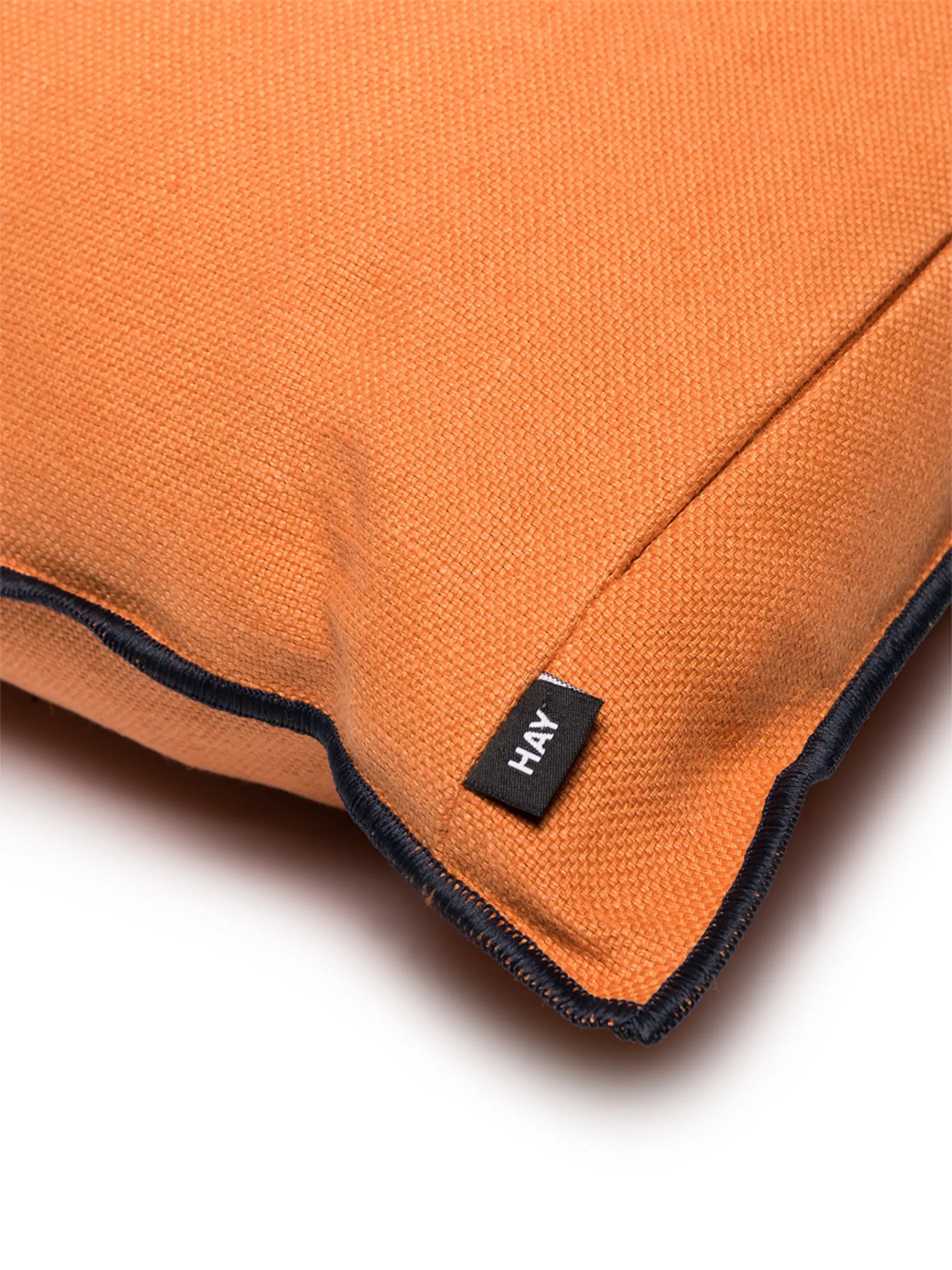 Outline contrast trim cushion