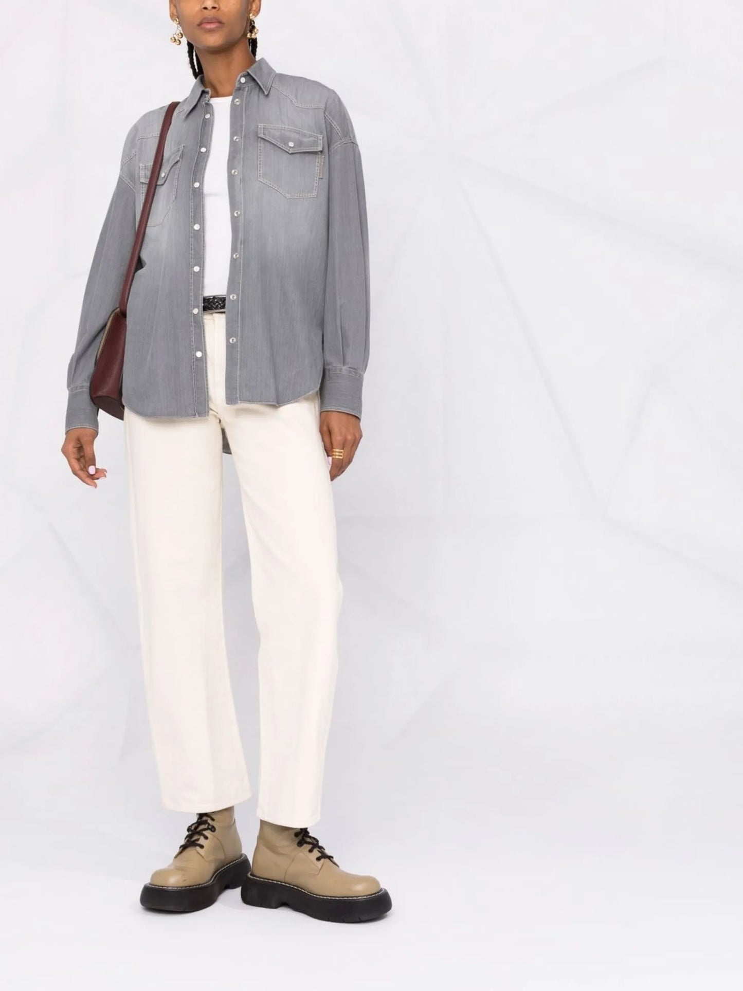 snap-fastening denim shirt