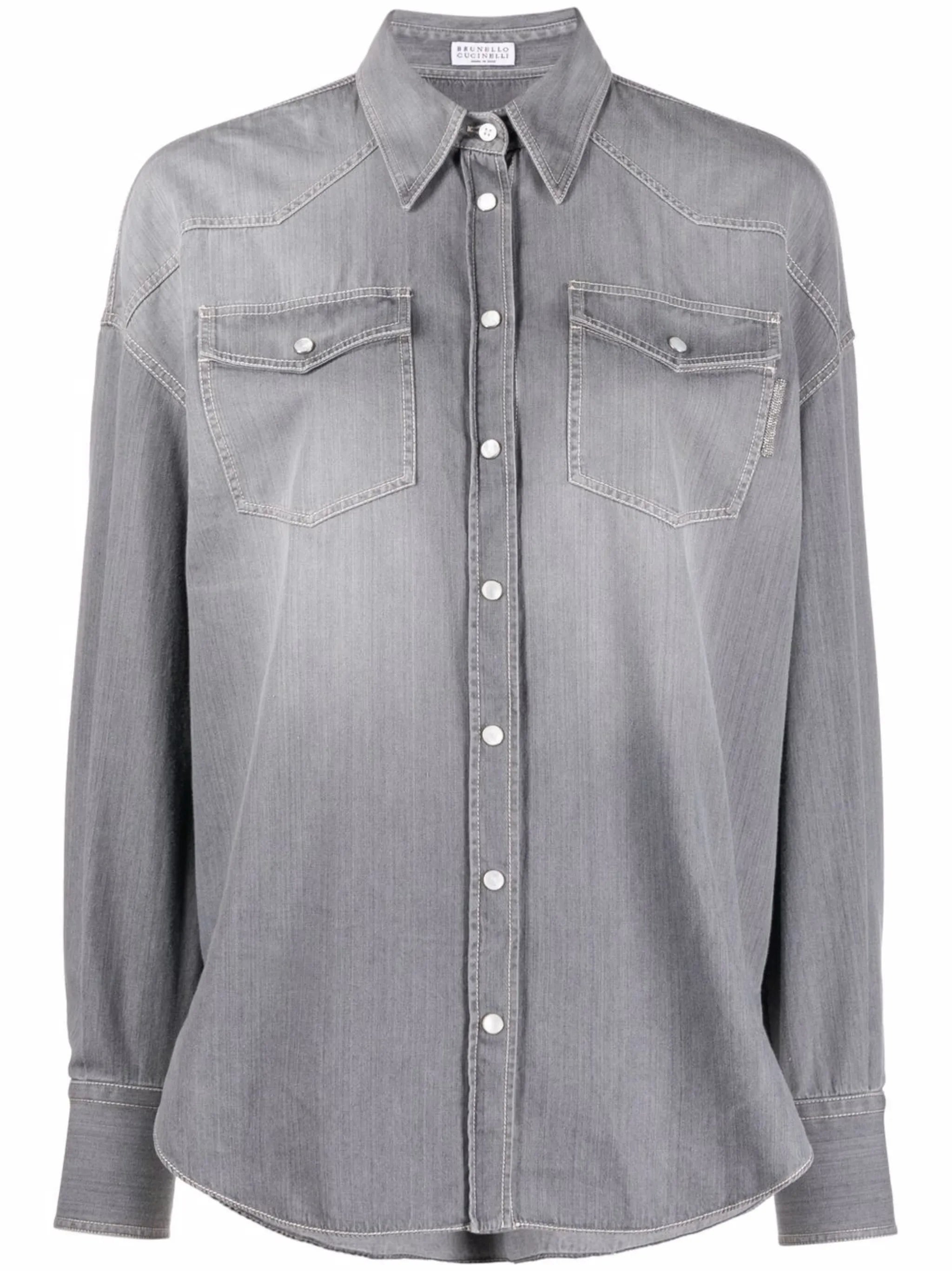 snap-fastening denim shirt