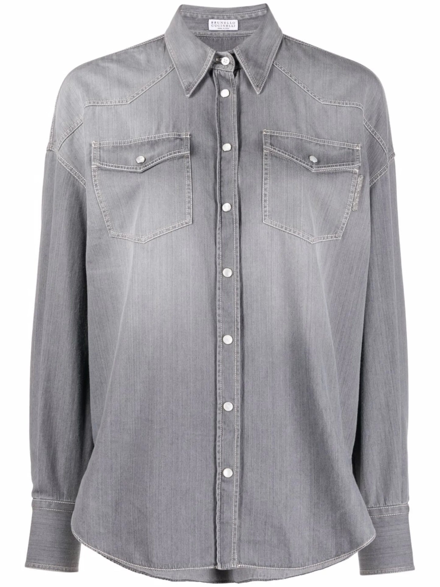 snap-fastening denim shirt