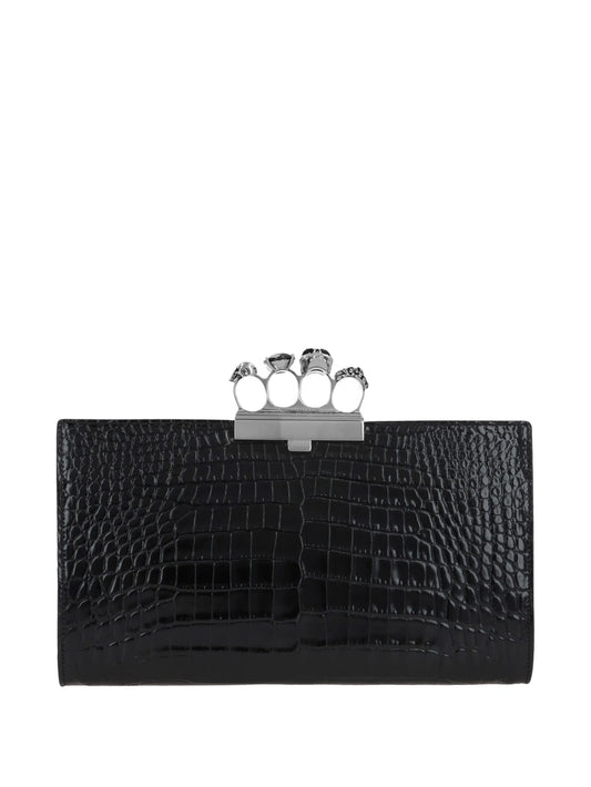 crocodile-embossed knuckleduster clutch