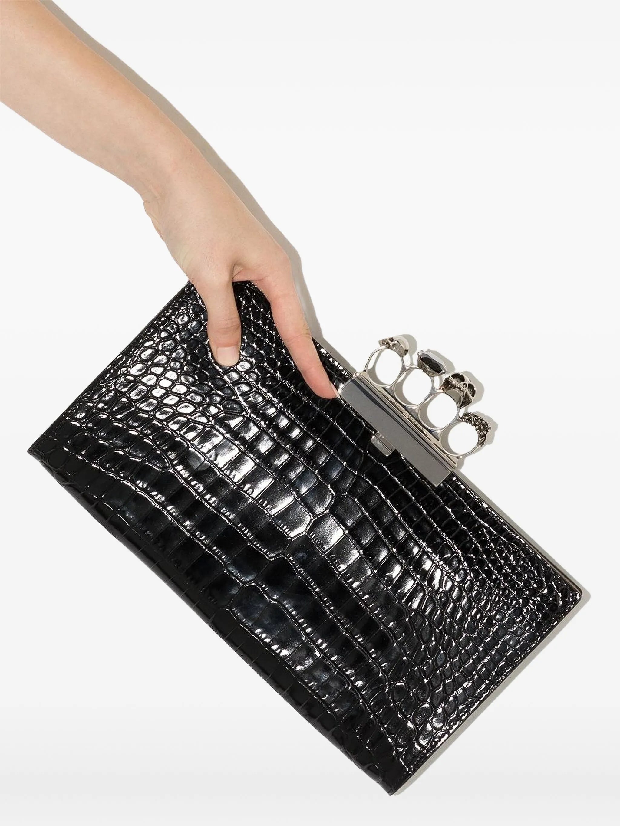 crocodile-embossed knuckleduster clutch