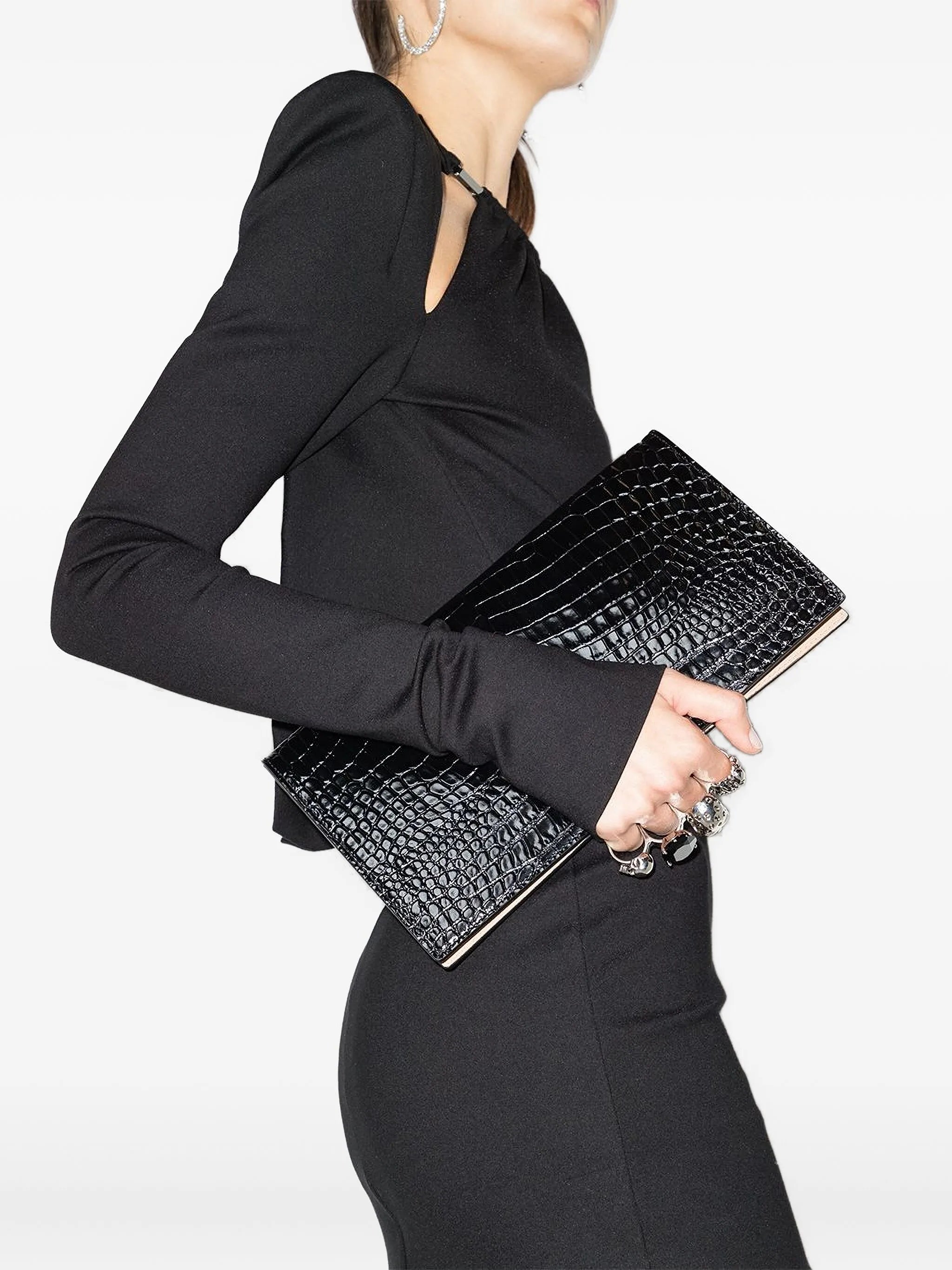 crocodile-embossed knuckleduster clutch