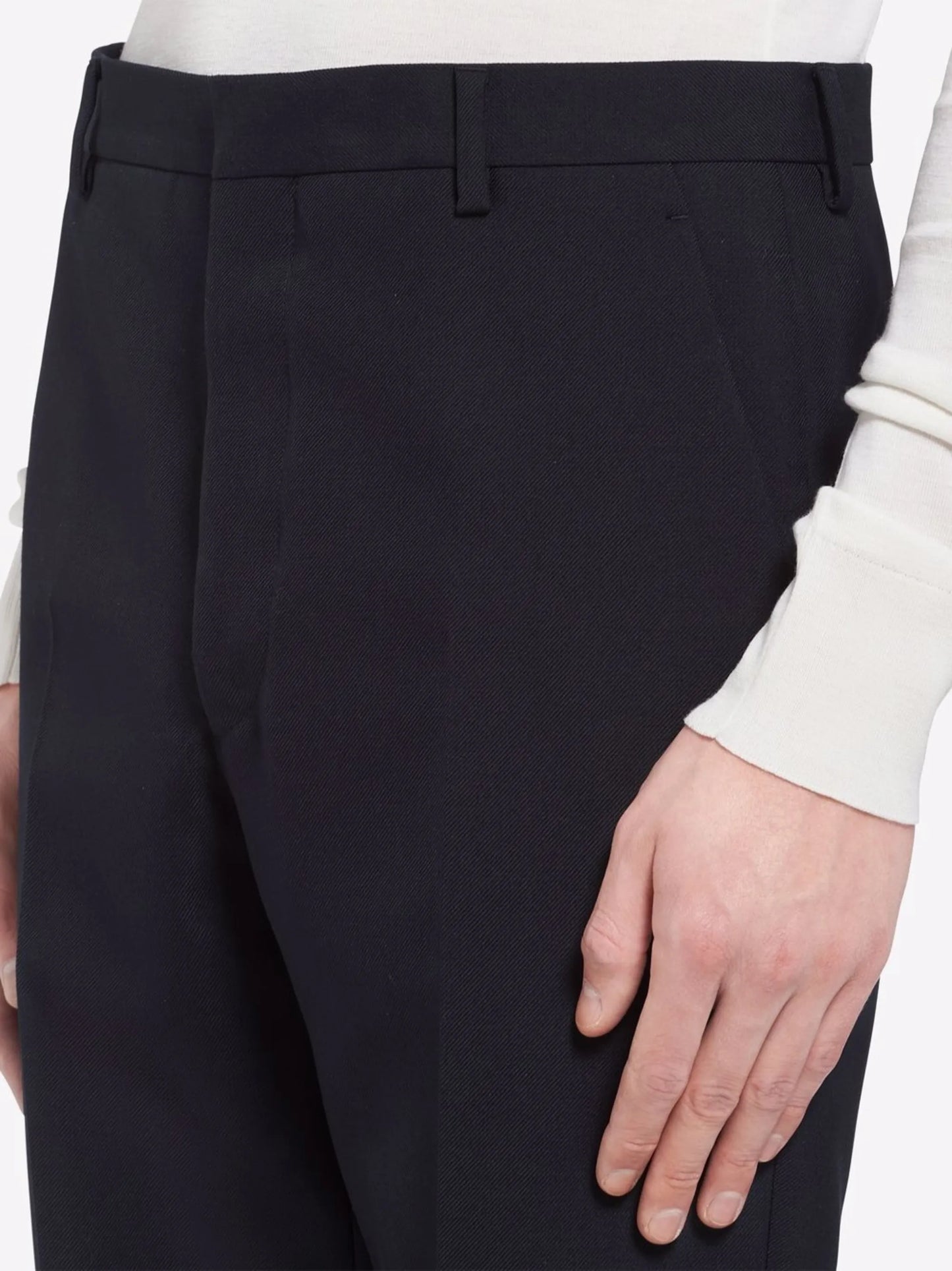 pressed-crease tailored trousers