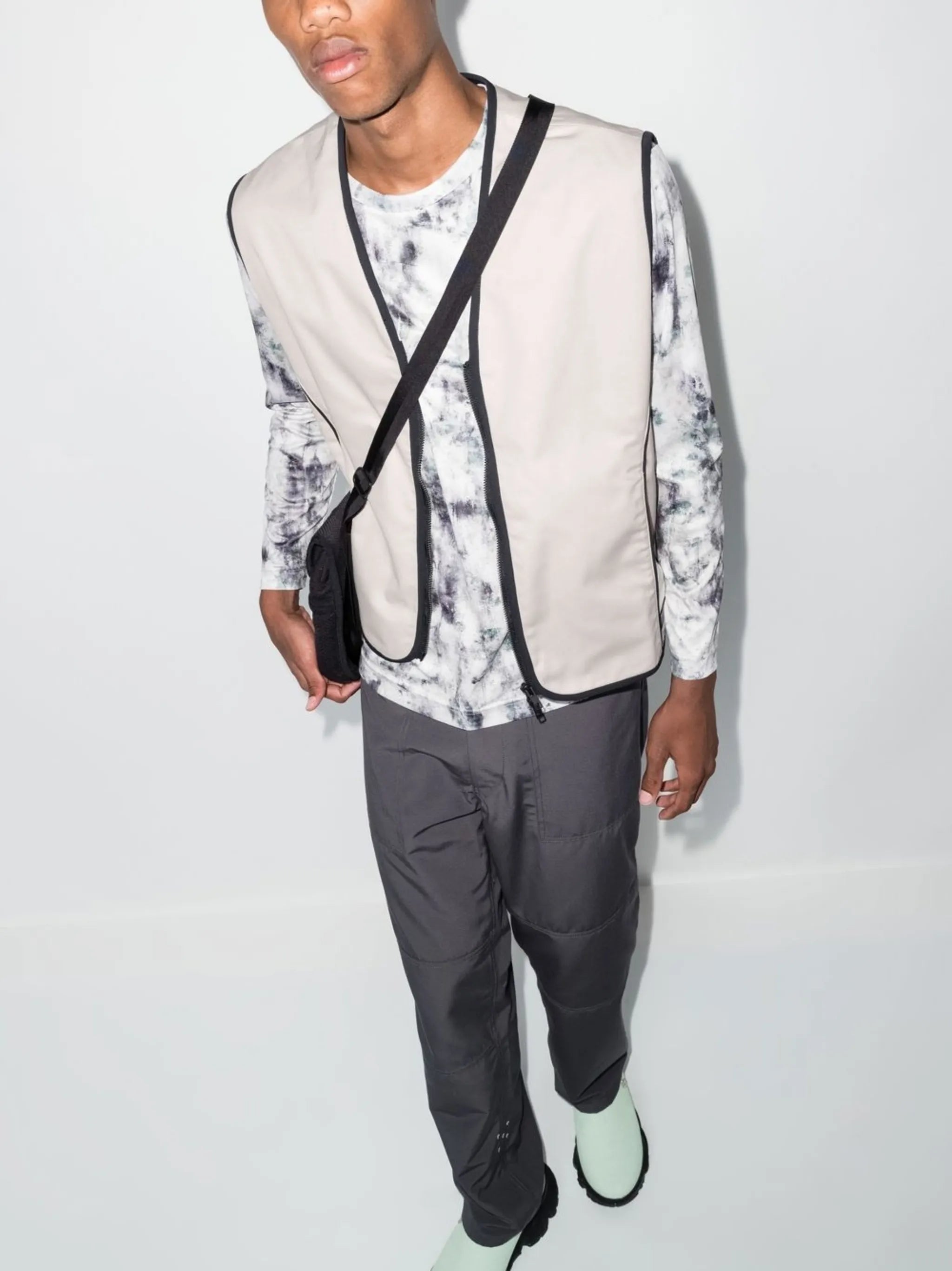 zip-fastening sleeveless jacket