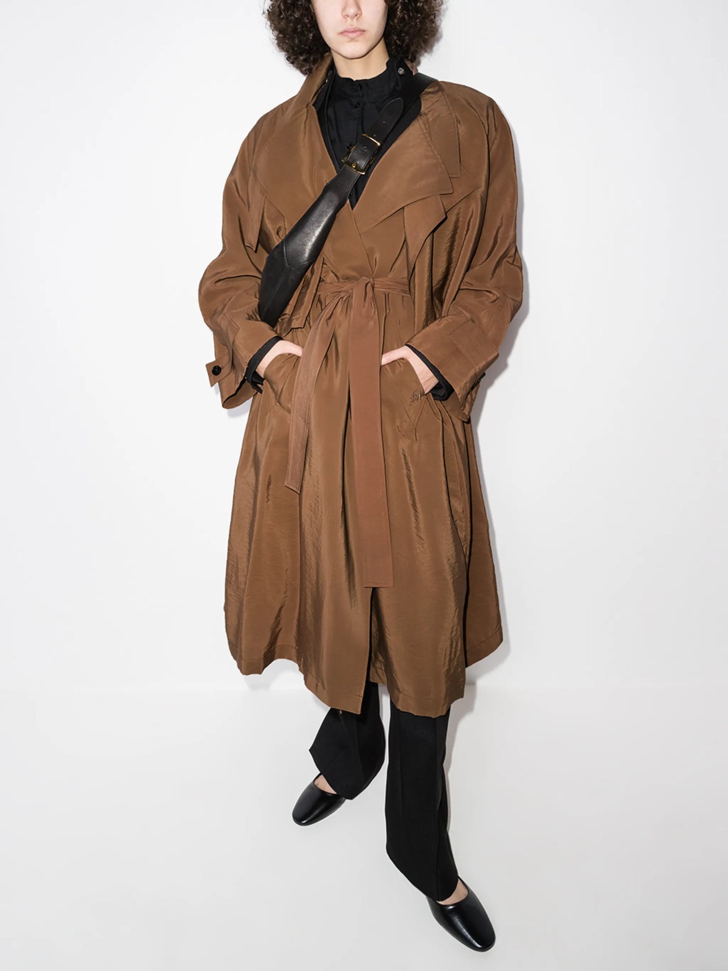 layered belted trench coat