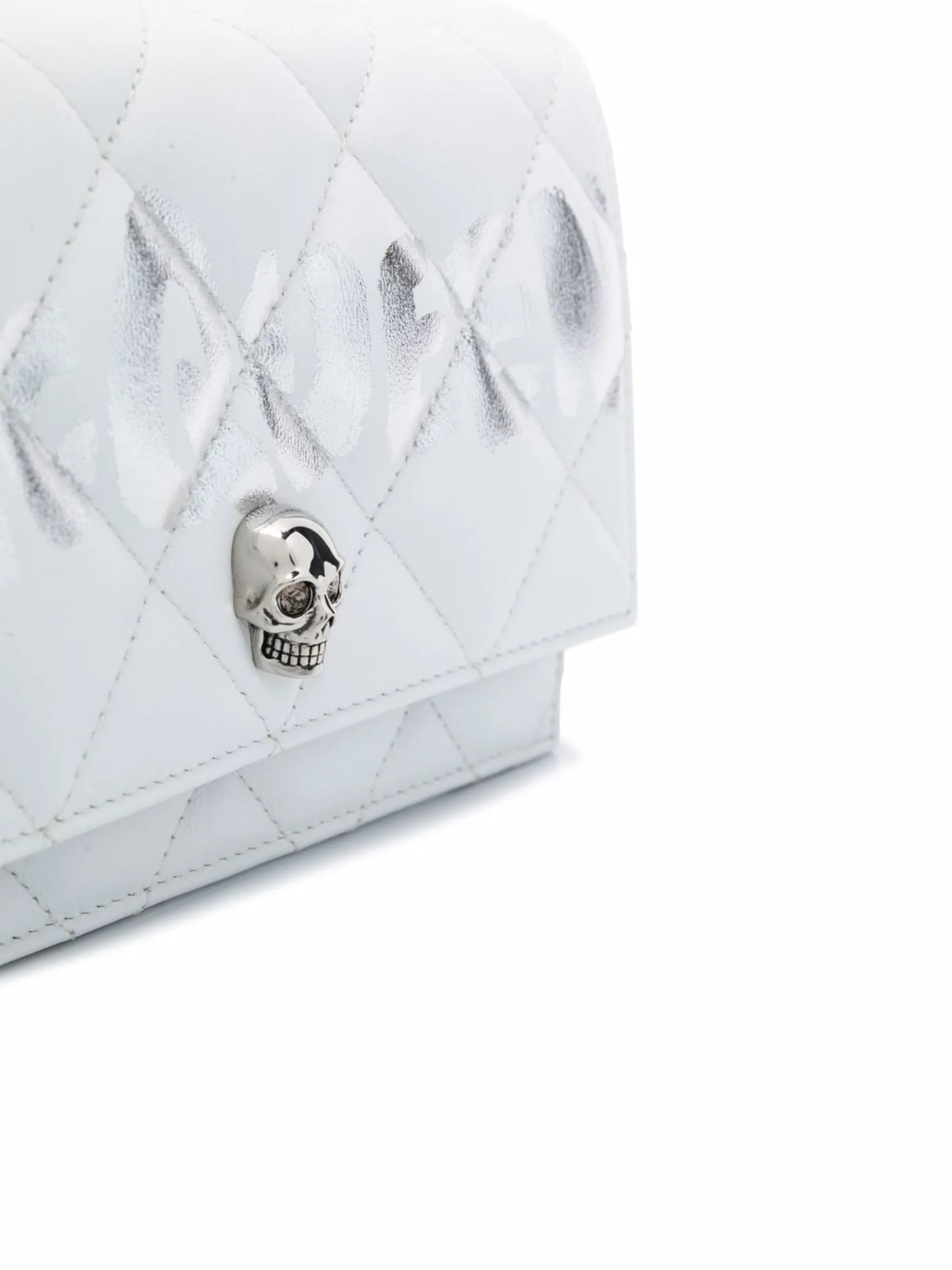 skull-motif quilted crossbody bag