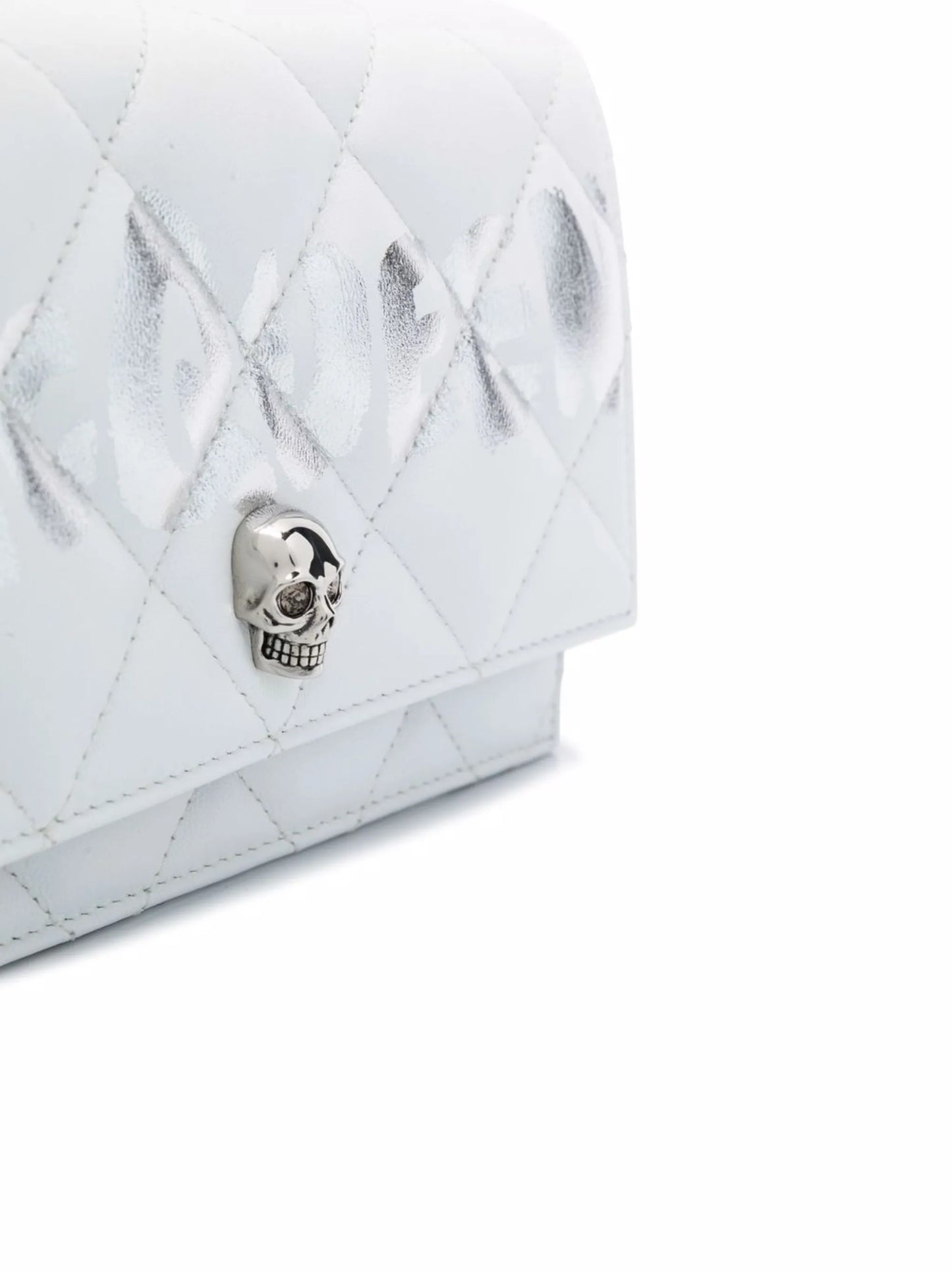 skull-motif quilted crossbody bag
