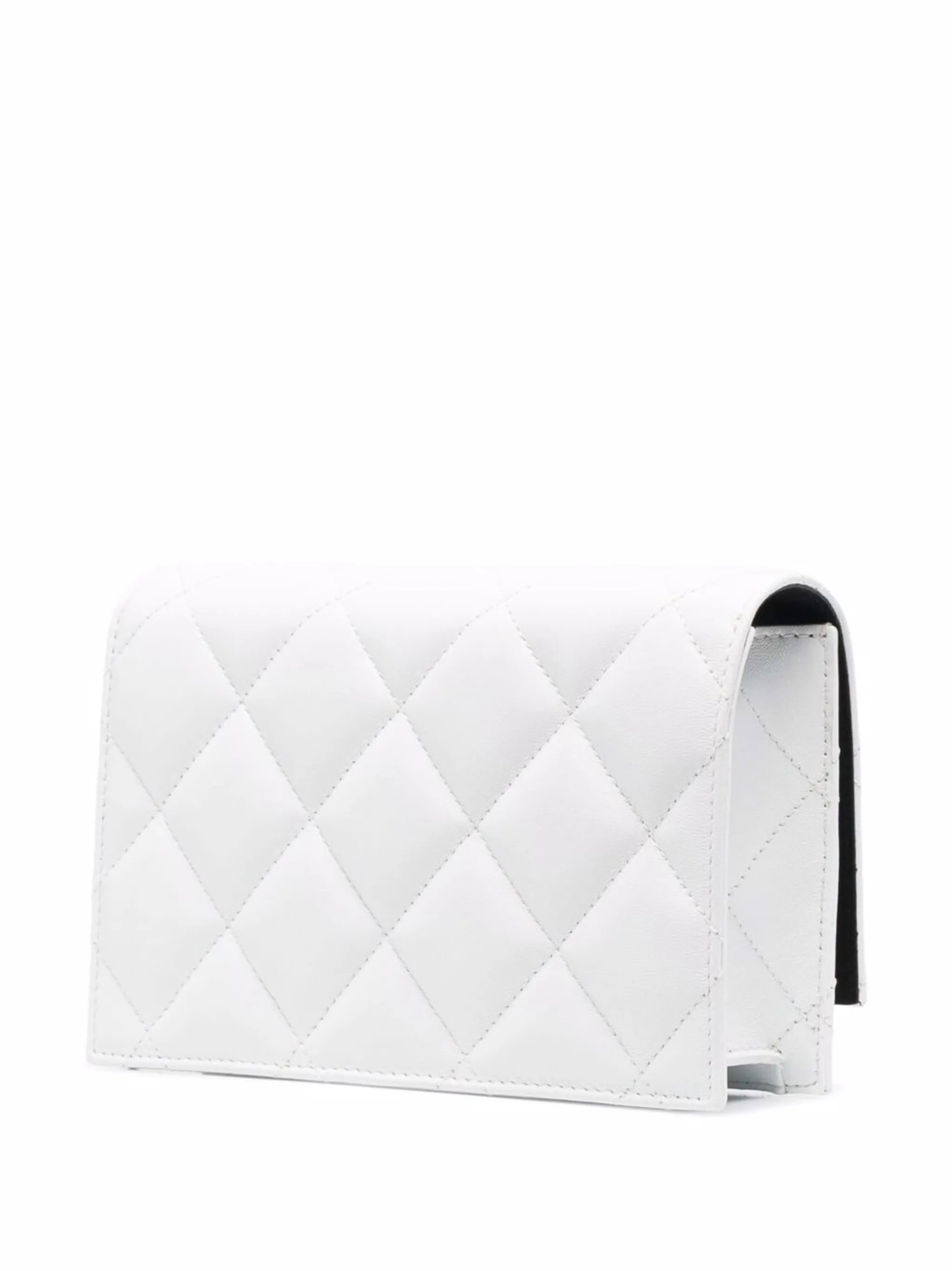 skull-motif quilted crossbody bag