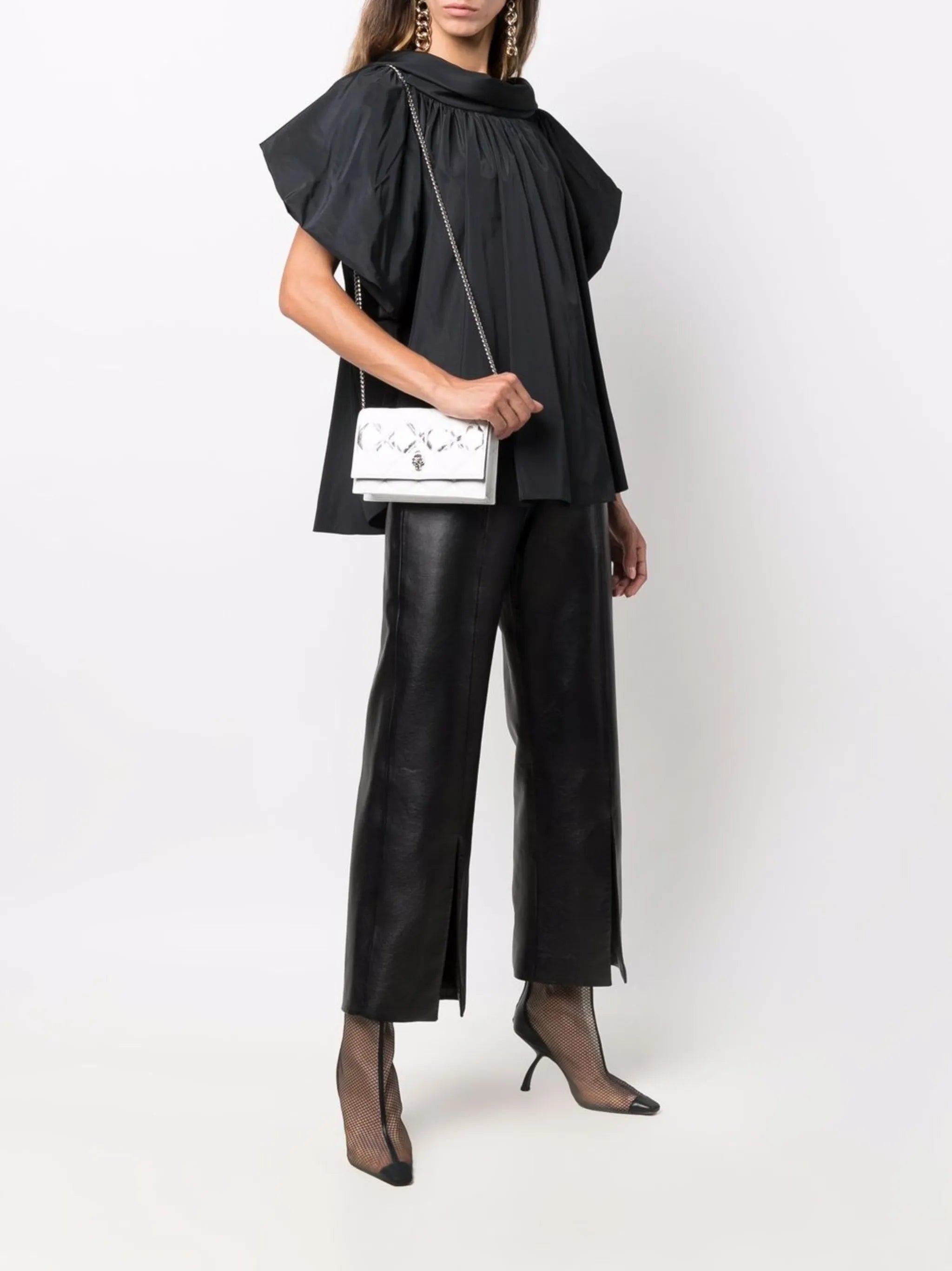 skull-motif quilted crossbody bag