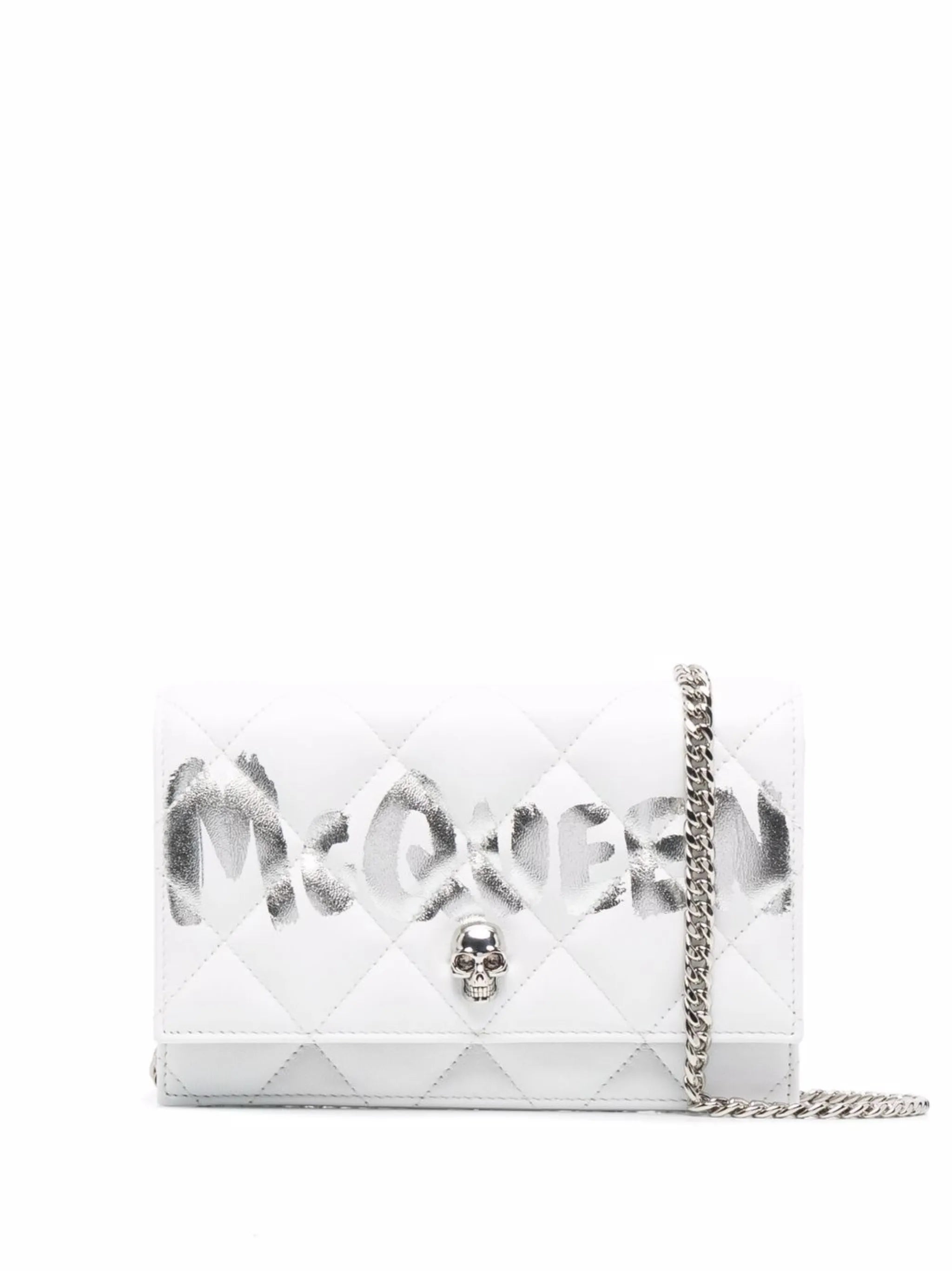 skull-motif quilted crossbody bag