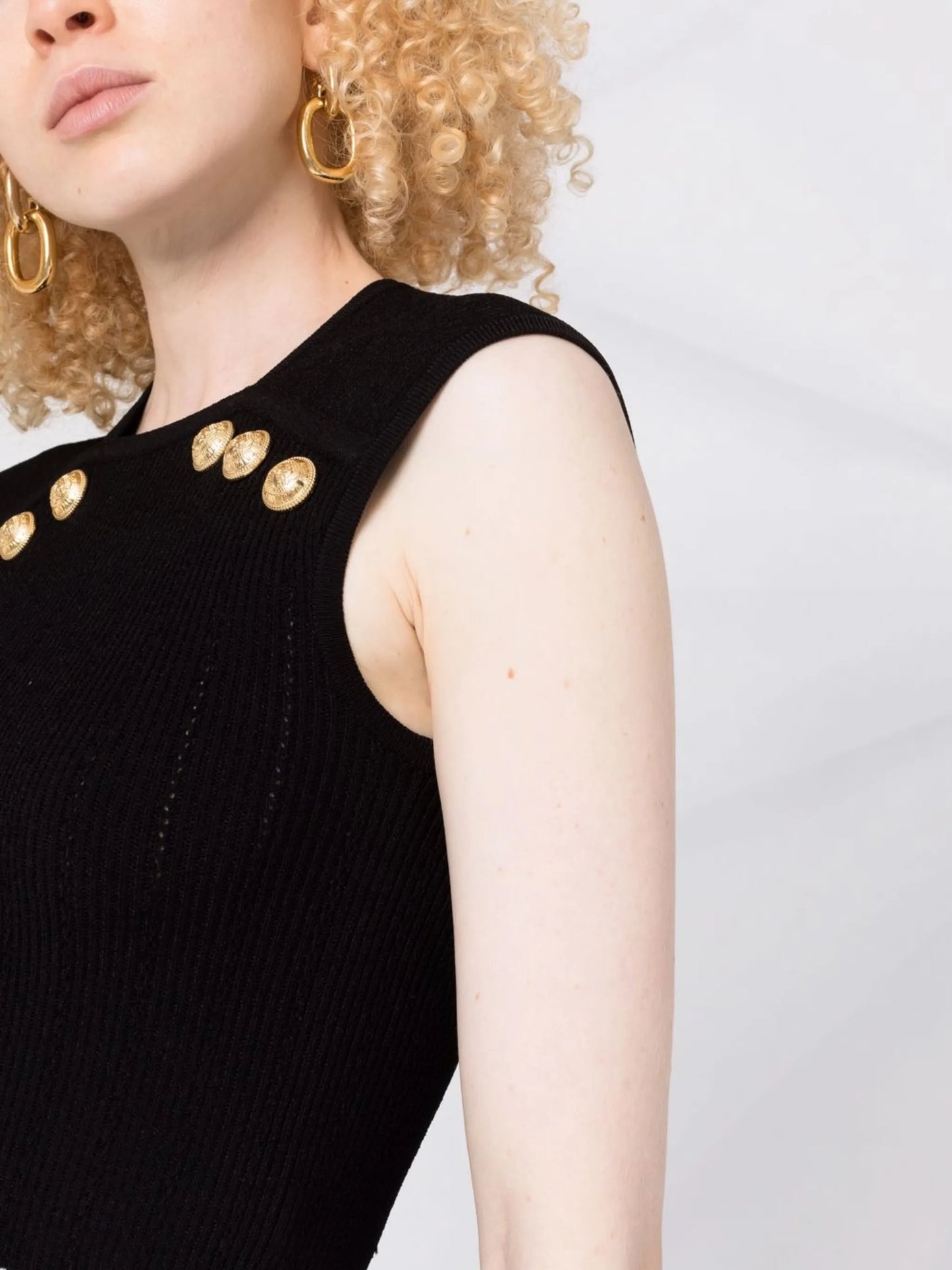 button-embellished knitted top