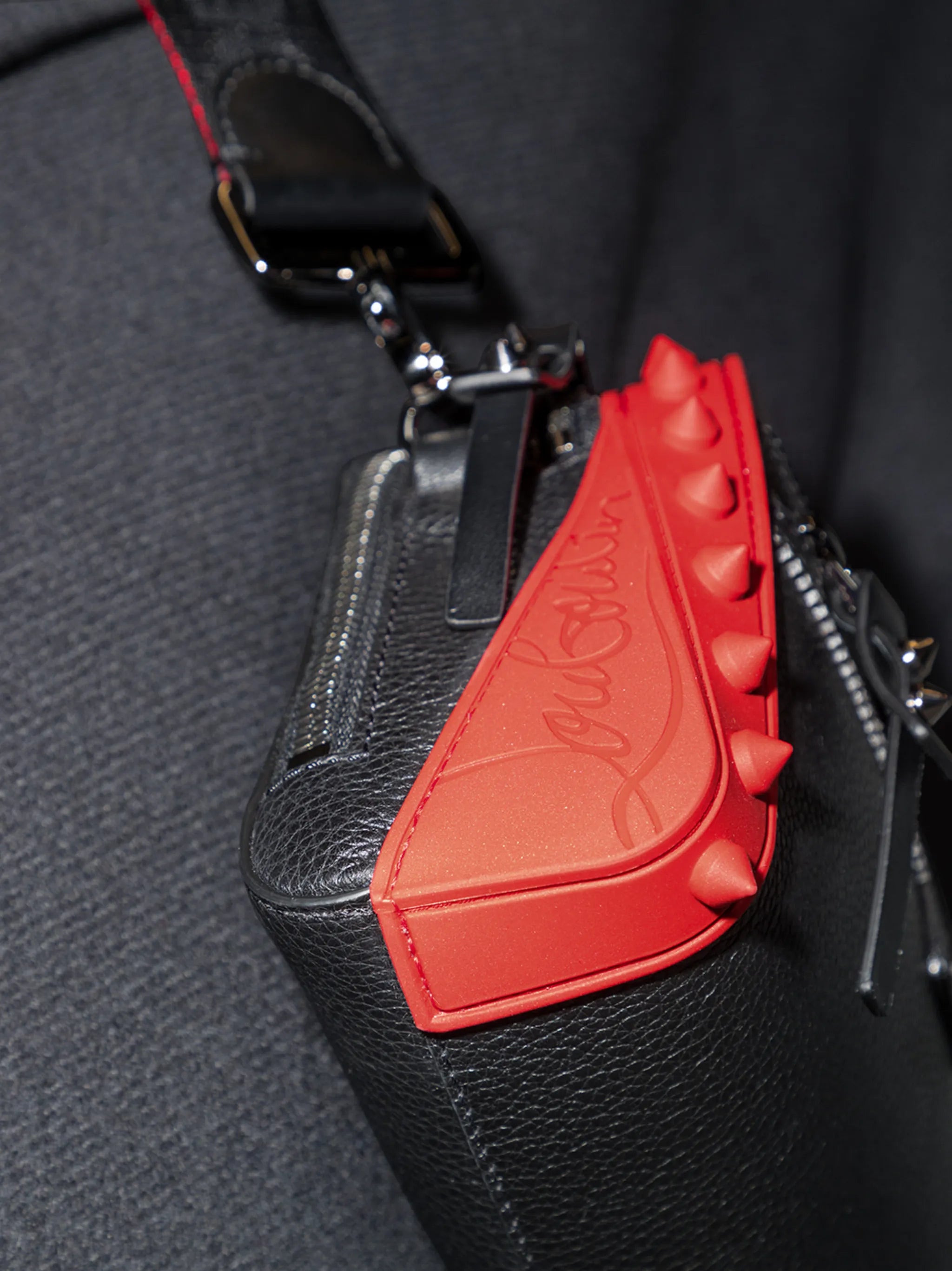 Loubitown leather clutch